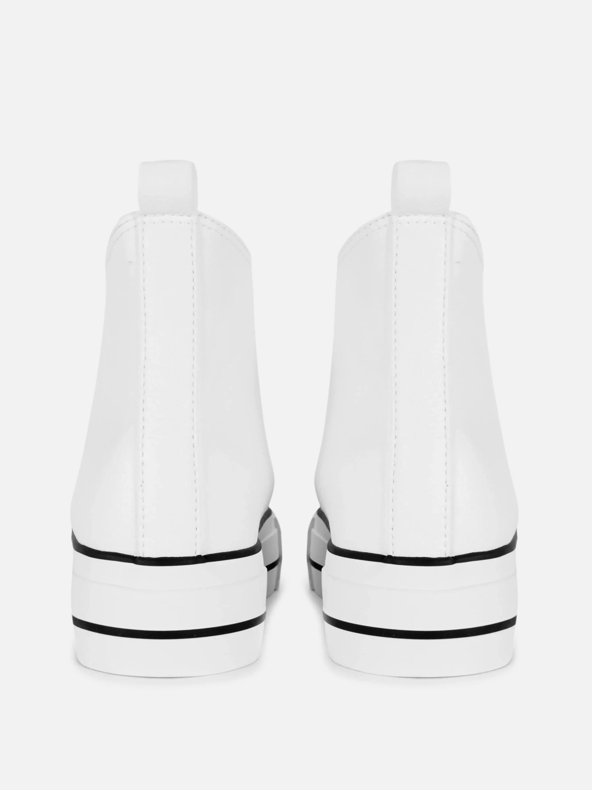 baskets_montantes_compens_2-1.webp Baskets Montantes Compensées En Simili Cuir