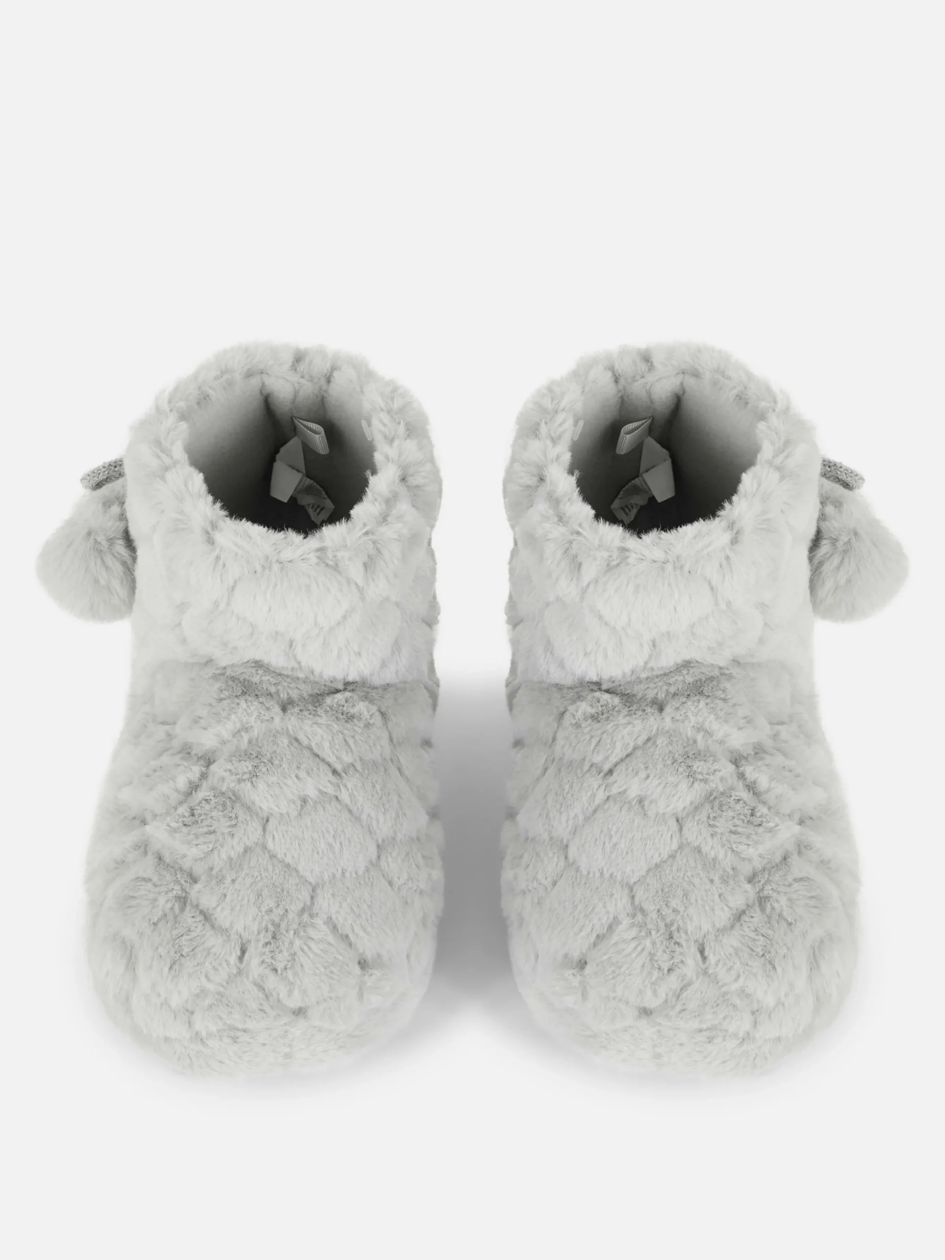 bottines_duveteuses__pomp_1-1.webp Bottines Duveteuses à Pompons