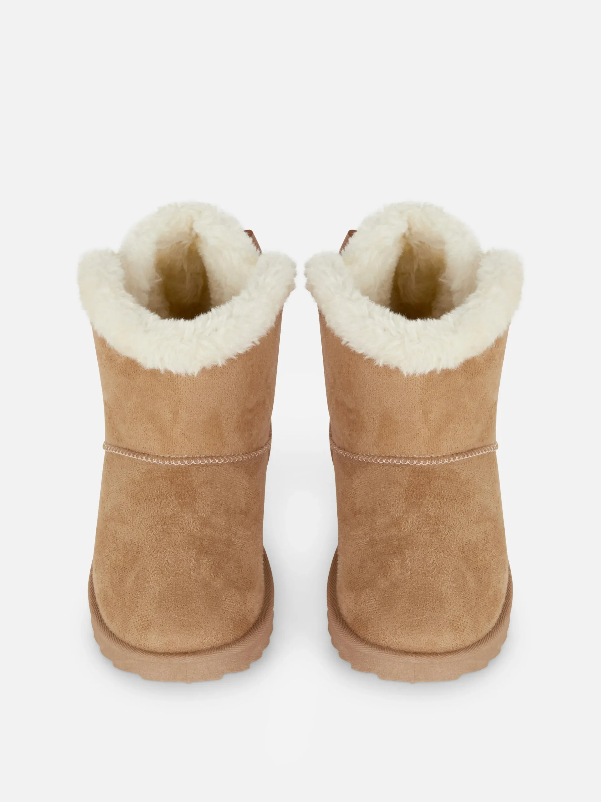 bottines_en_fausse_fourru_1.webp Bottines En Fausse Fourrure Avec Nœud