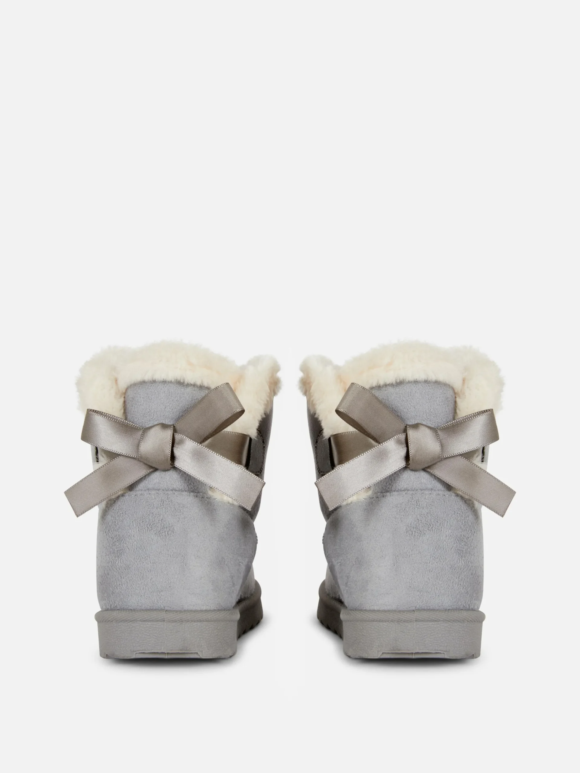 bottines_ornes_dun_nud_2.webp Bottines Ornées D'un Nœud