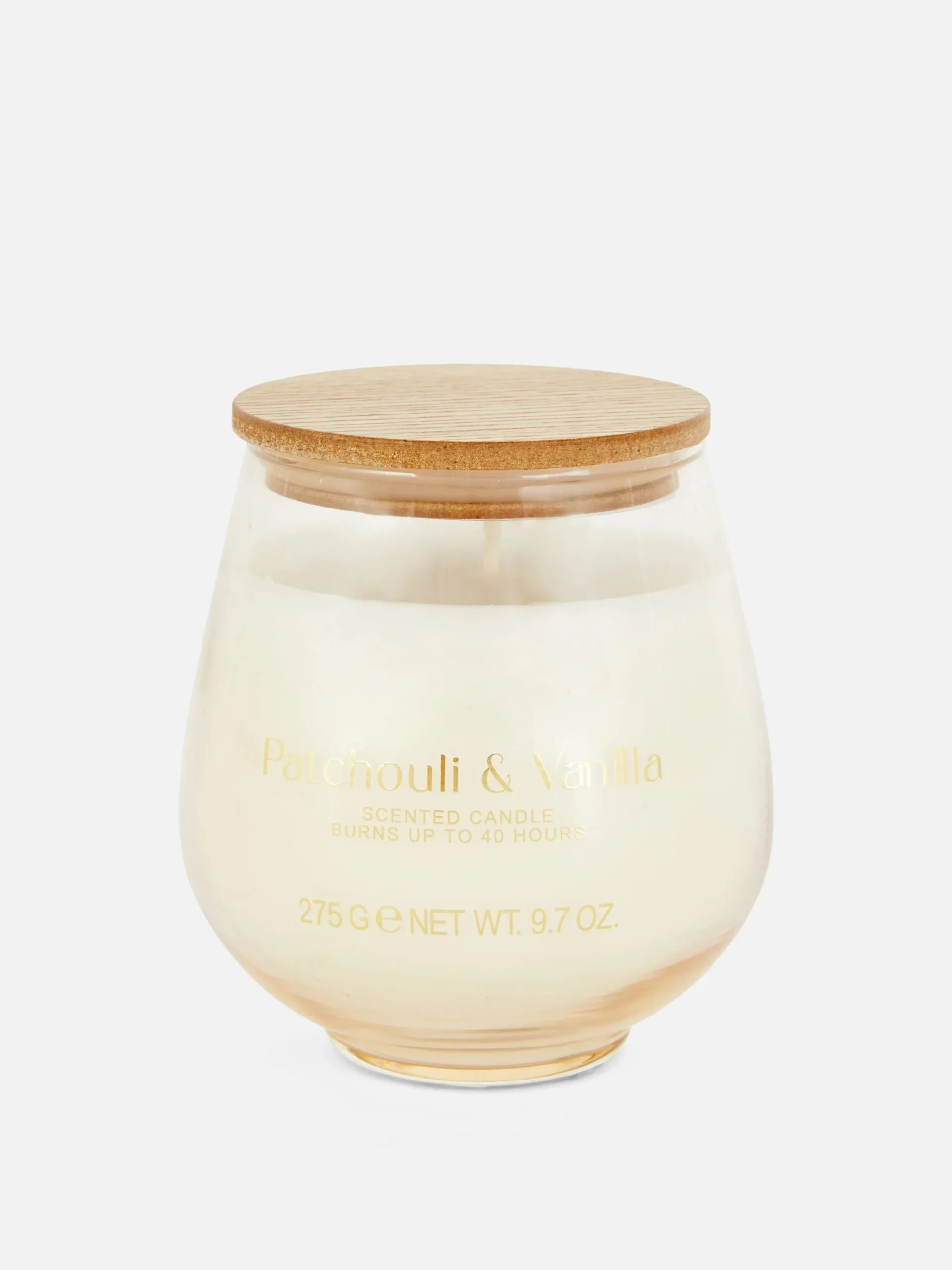 bougie_parfume_dans_un_po_0-1.webp Bougie Parfumée Dans Un Pot En Verre Incurvé