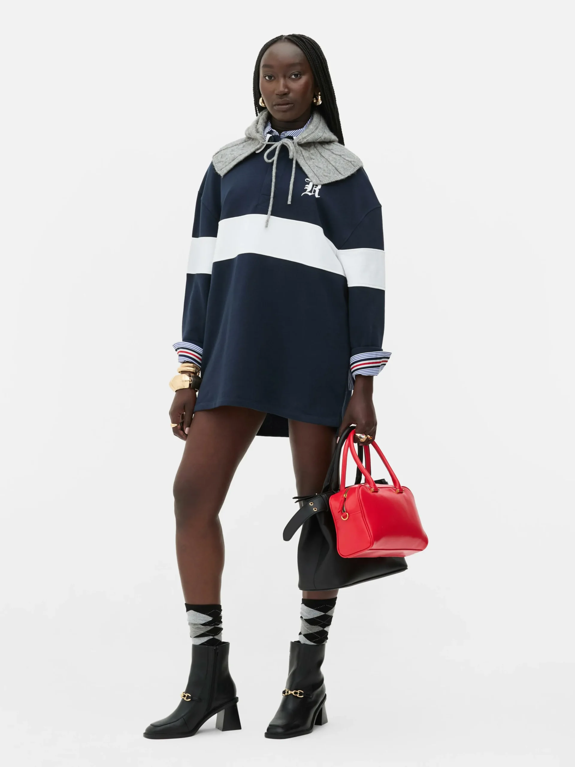 capuche_en_maille_torsade_0.webp Capuche En Maille Torsadée Rita Ora