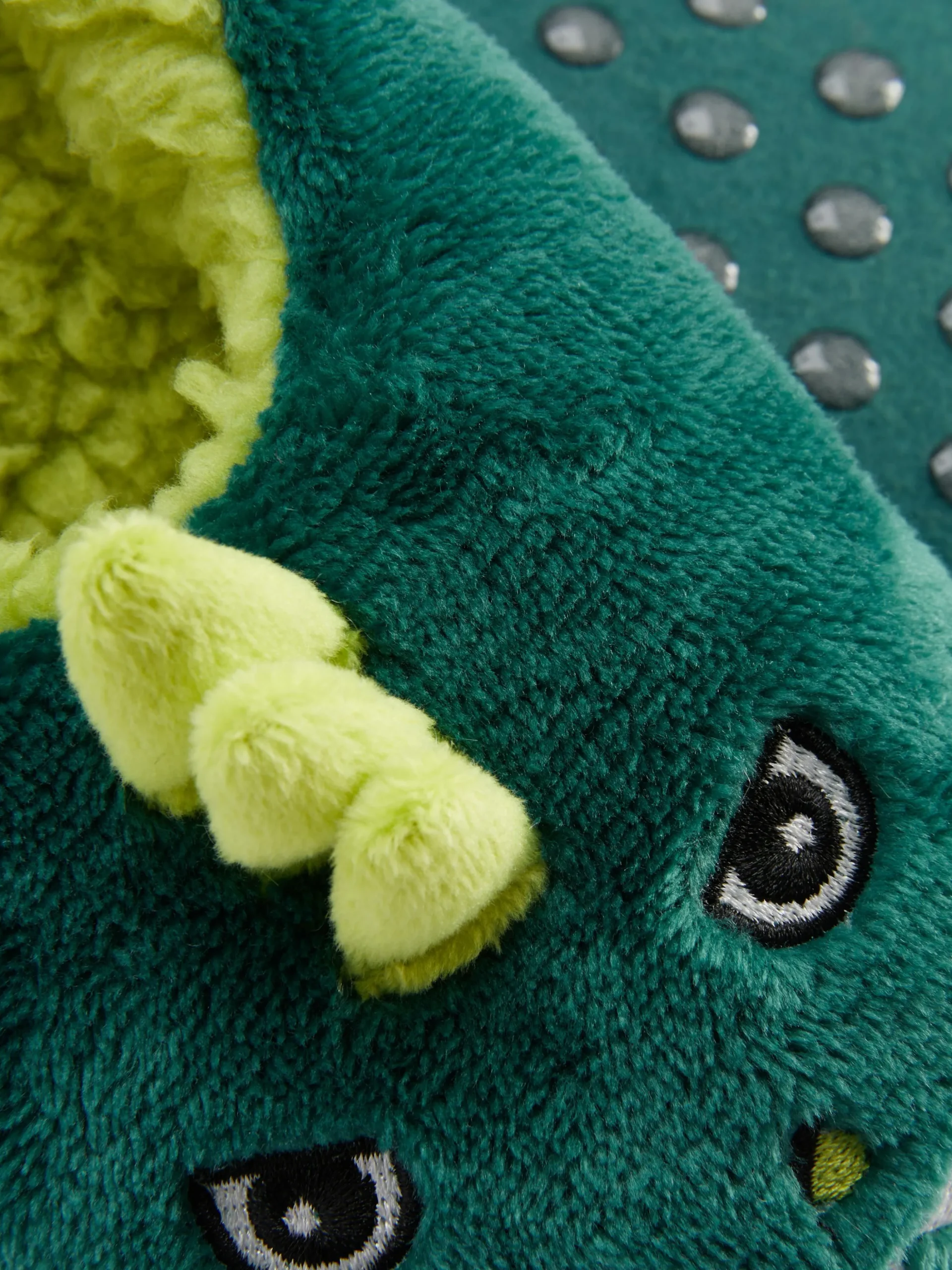 chaussons__motif_dinosaur_1.webp Chaussons à Motif Dinosaure