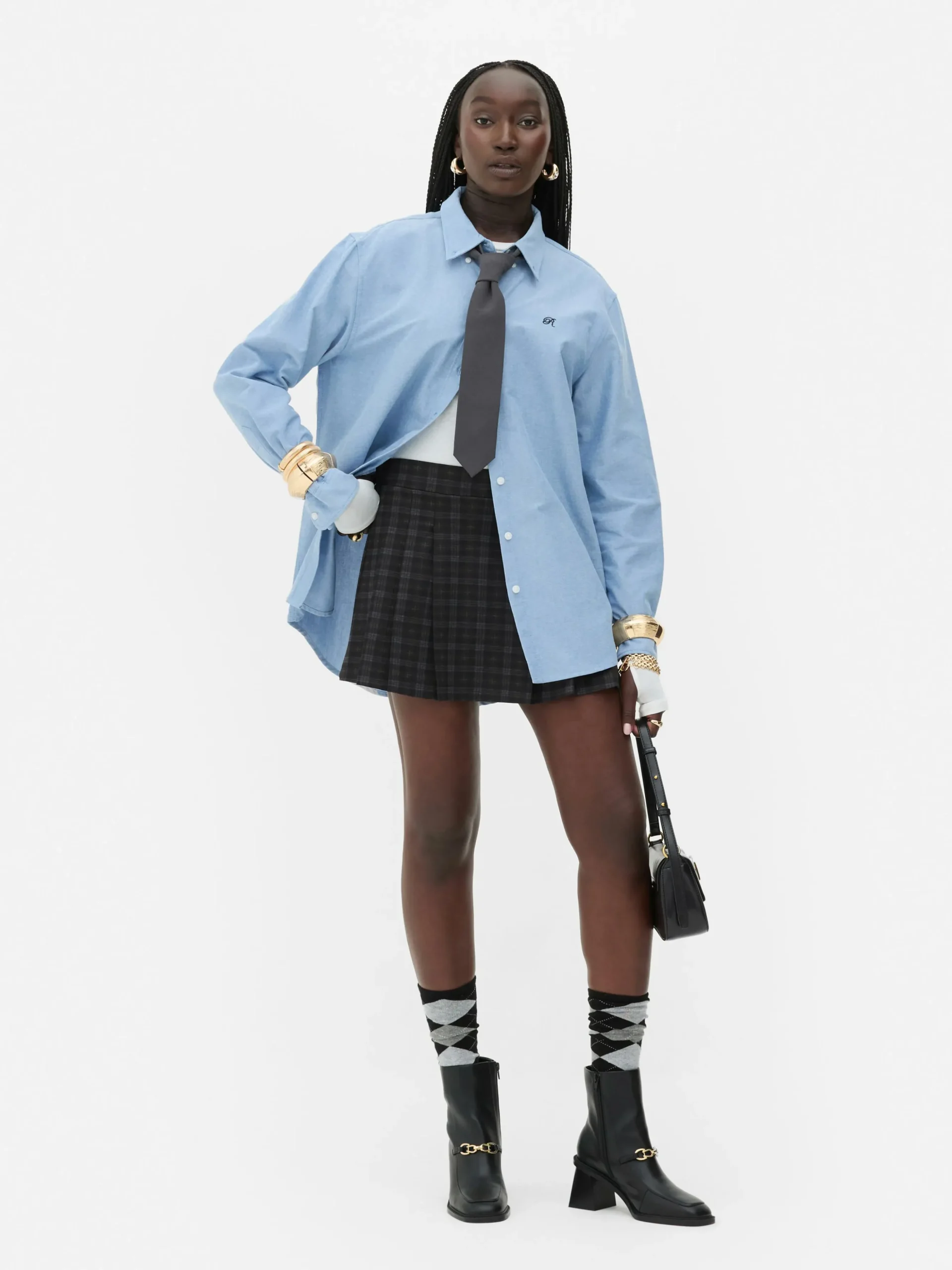 chemise_oxford_boutonne_r_0.webp Chemise Oxford Boutonnée Rita Ora