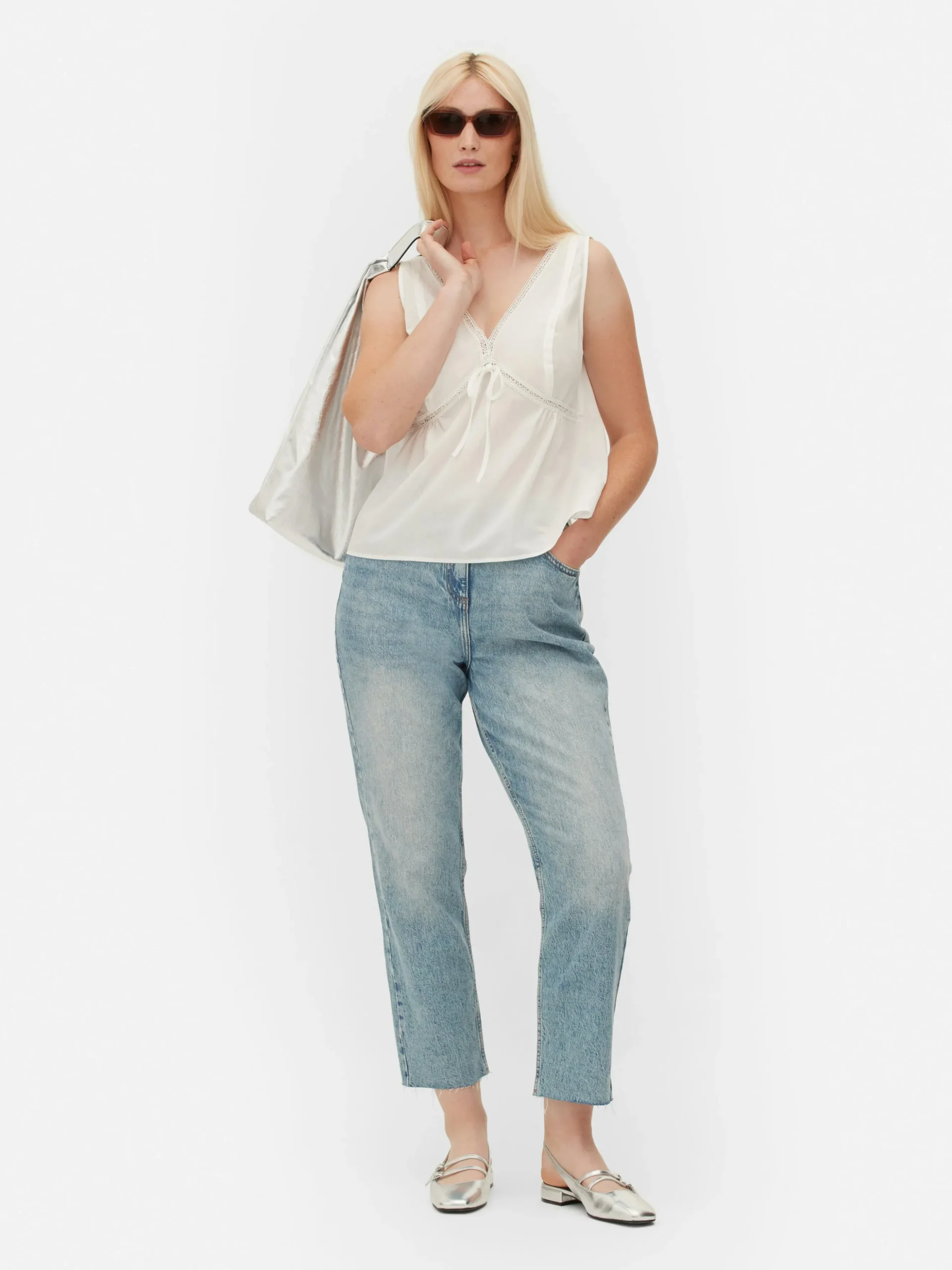 chemisier_sans_manches__c_0.webp Chemisier Sans Manches à Col En V