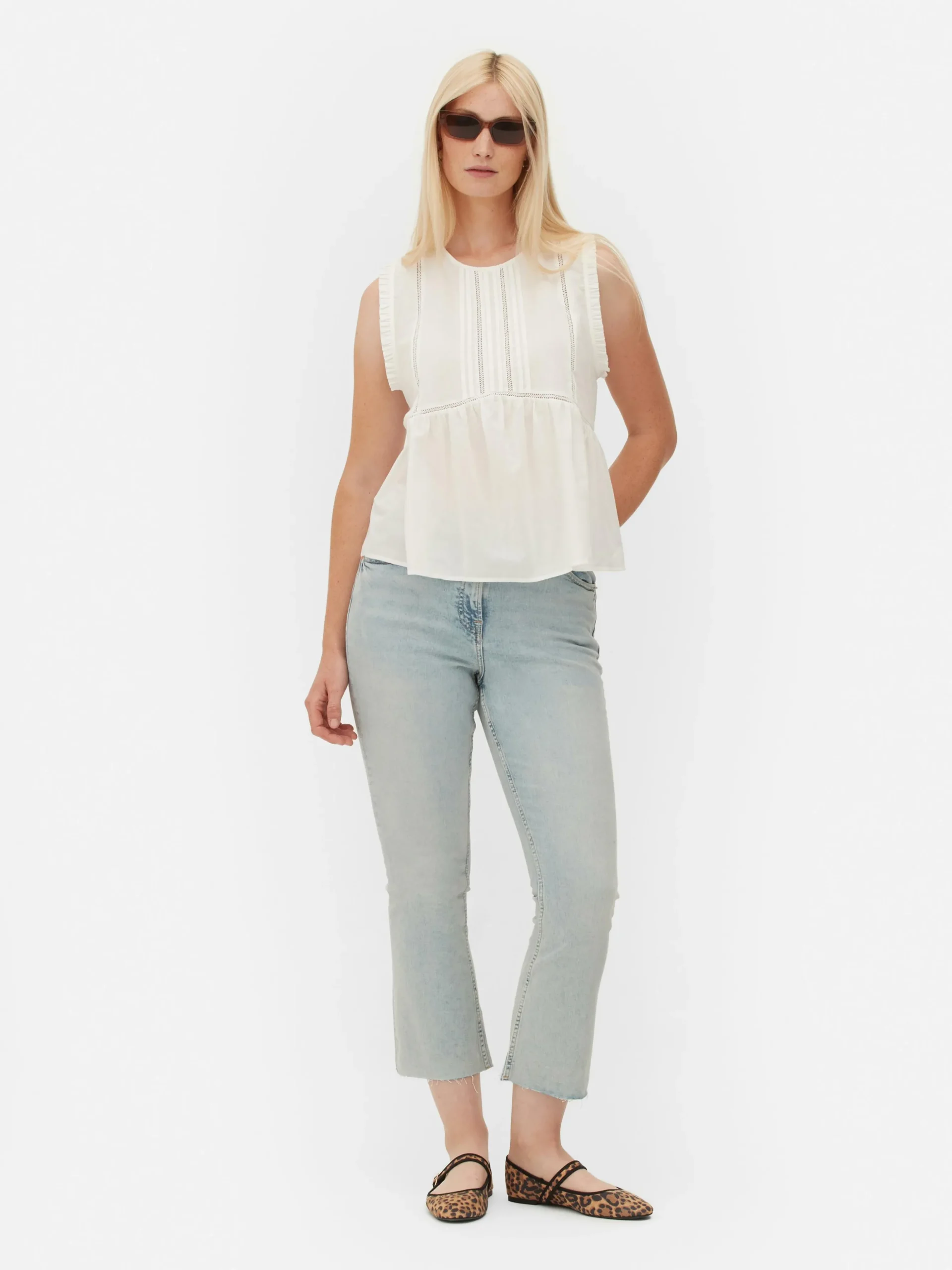 chemisier_sans_manches__v_0.webp Chemisier Sans Manches à Volants