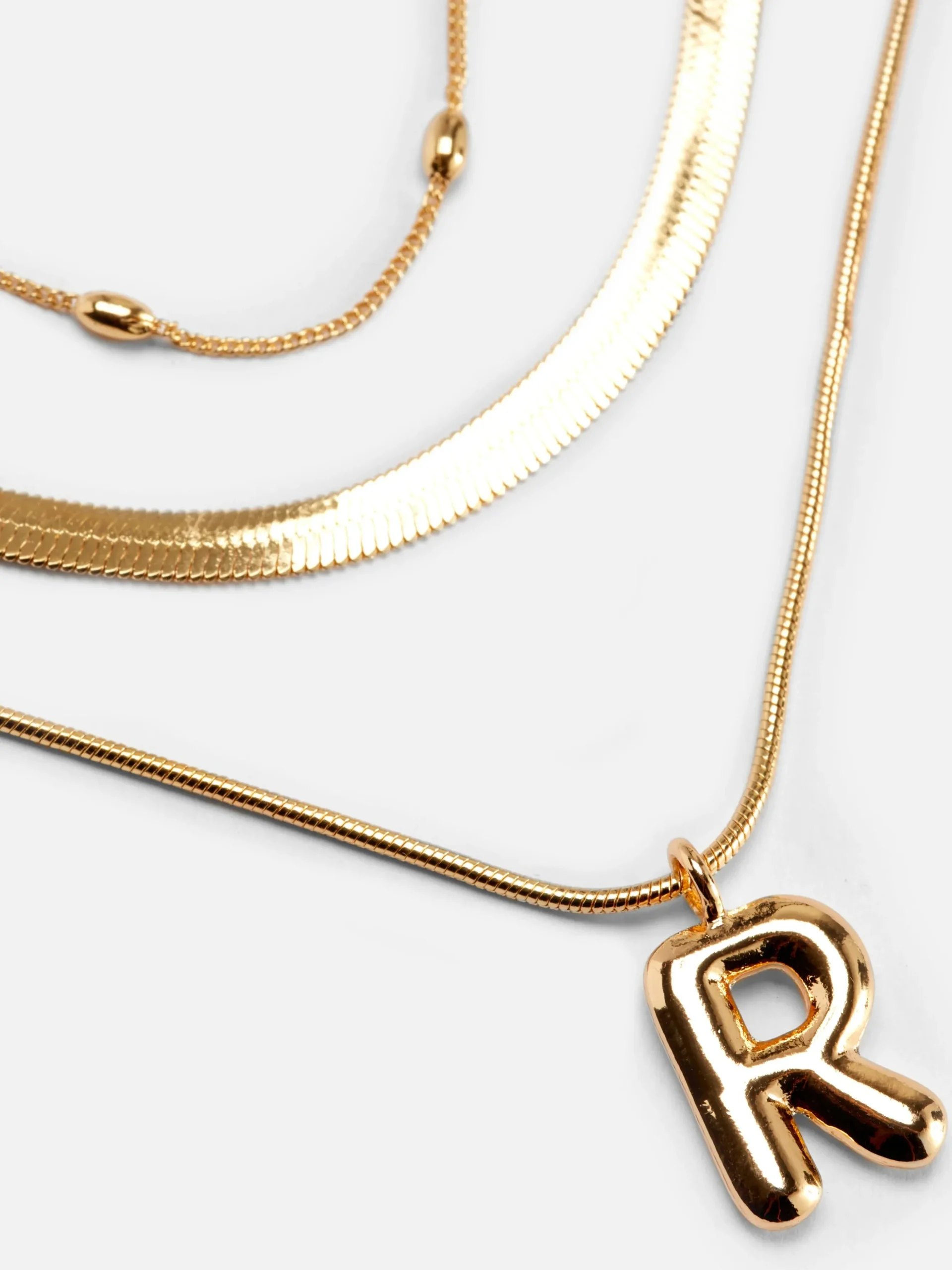 collier__superpositions_b_1.webp Collier à Superpositions Bouffant Avec Initiale