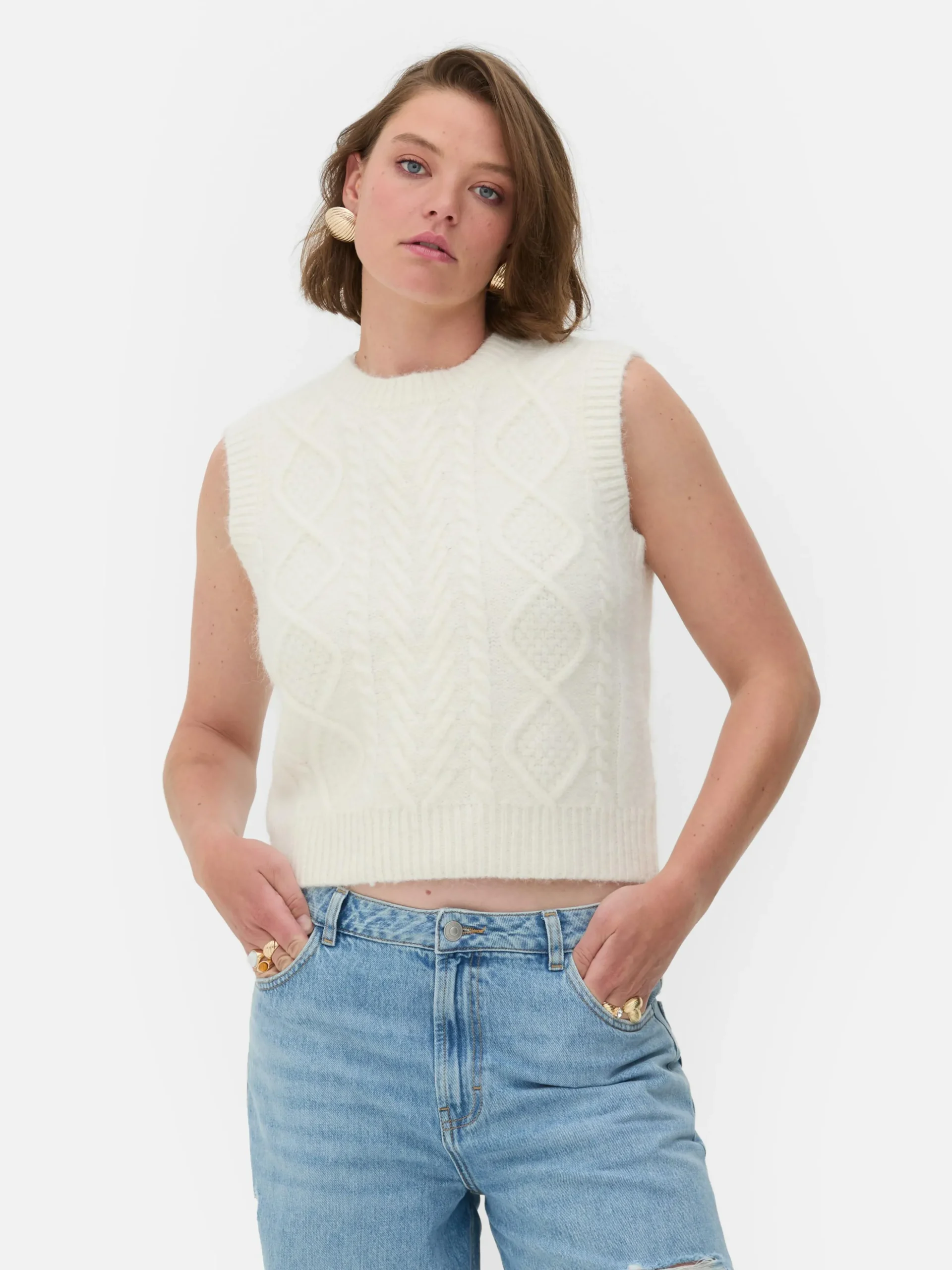 dbardeur_en_maille_torsad_0-1.webp Débardeur En Maille Torsadée Rita Ora