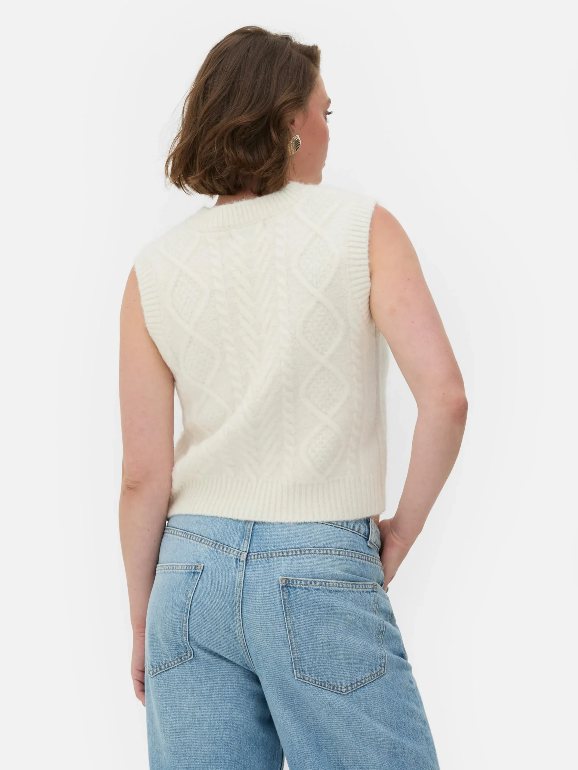 dbardeur_en_maille_torsad_3-1.webp Débardeur En Maille Torsadée Rita Ora