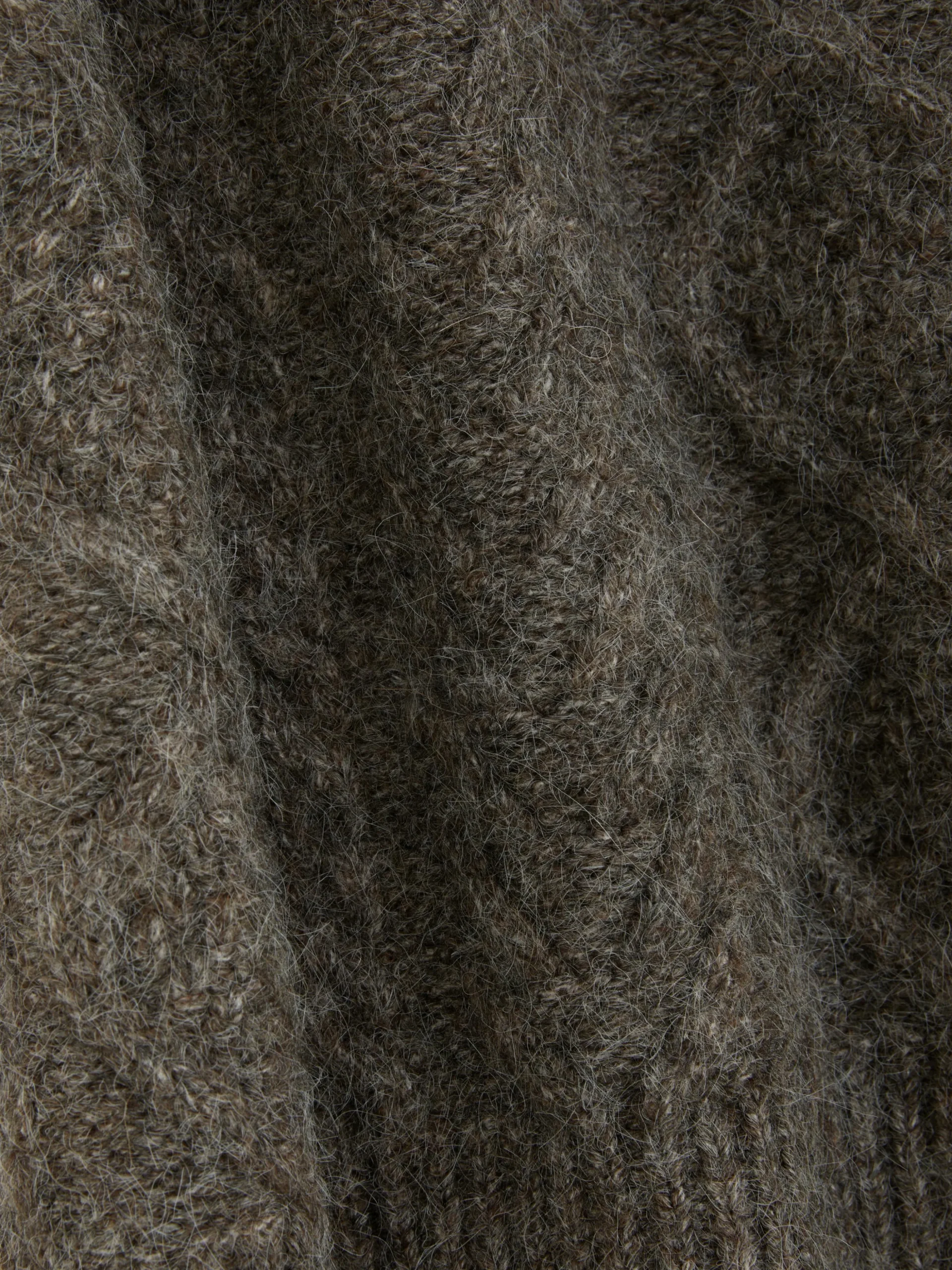 dbardeur_en_maille_torsad_6.webp Débardeur En Maille Torsadée Rita Ora