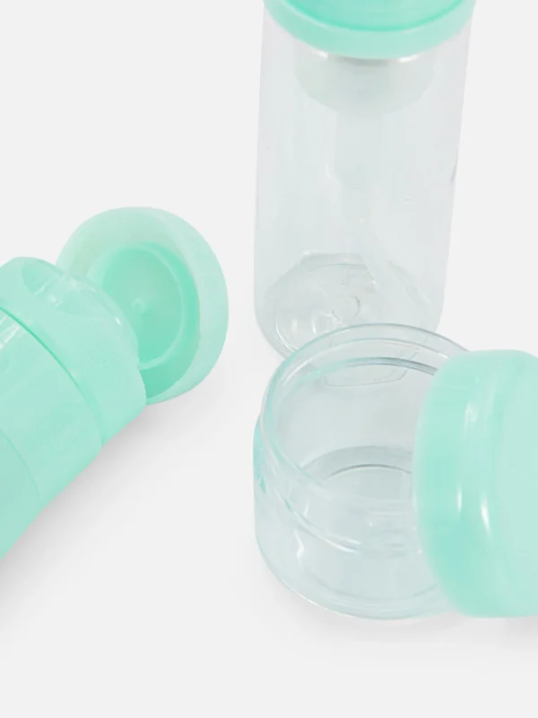 Ensemble De Flacons De Voyage