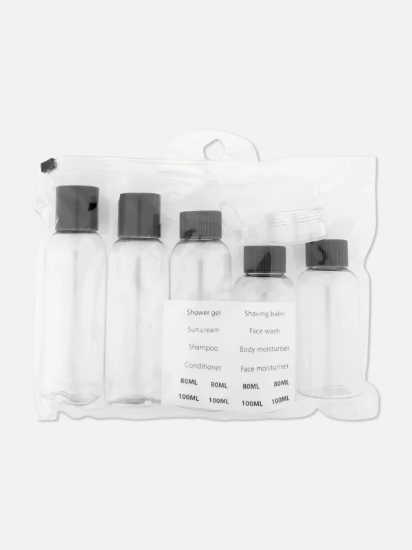 Ensemble De Flacons De Voyage Et D'étiquettes