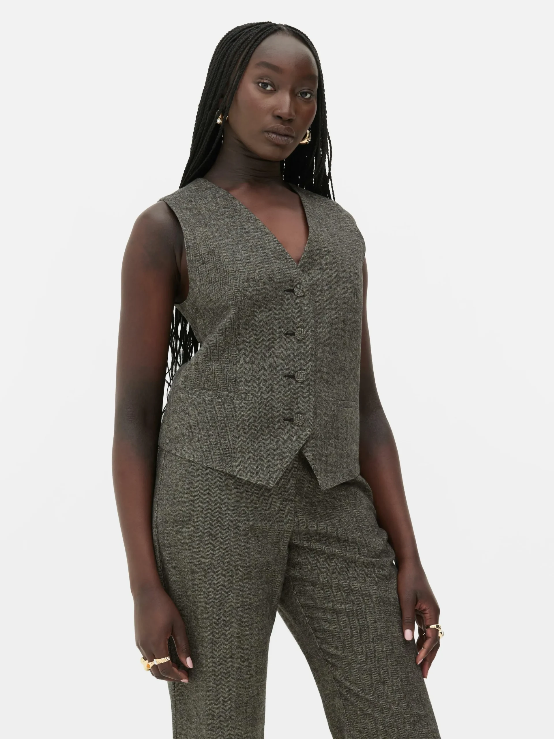 gilet_avec_chevrons__bout_1.webp Gilet Avec Chevrons à Boutonnage Simple Rita Ora