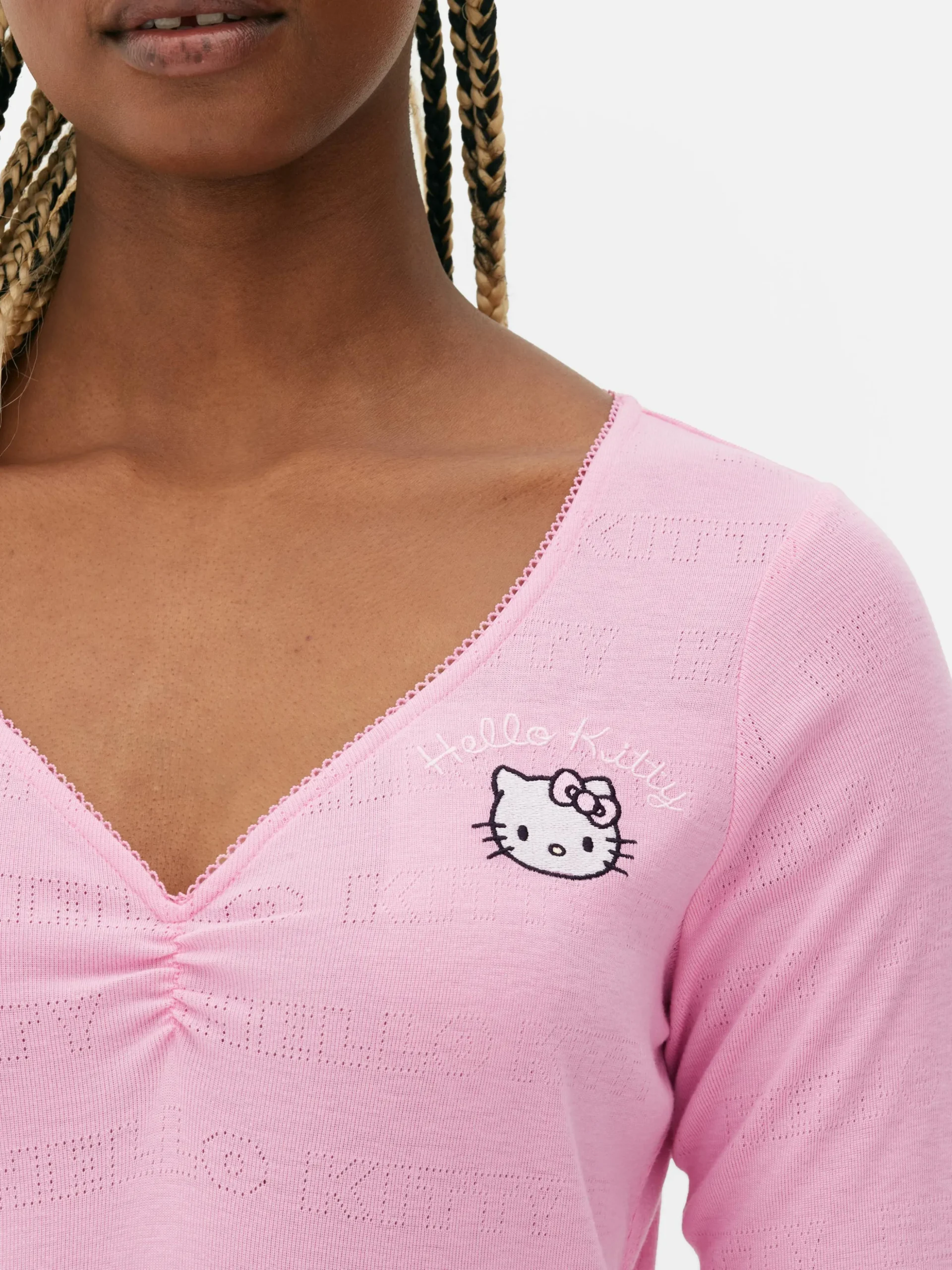 haut_de_pyjama_en_pointel_2.webp Haut De Pyjama En Pointelle Hello Kitty