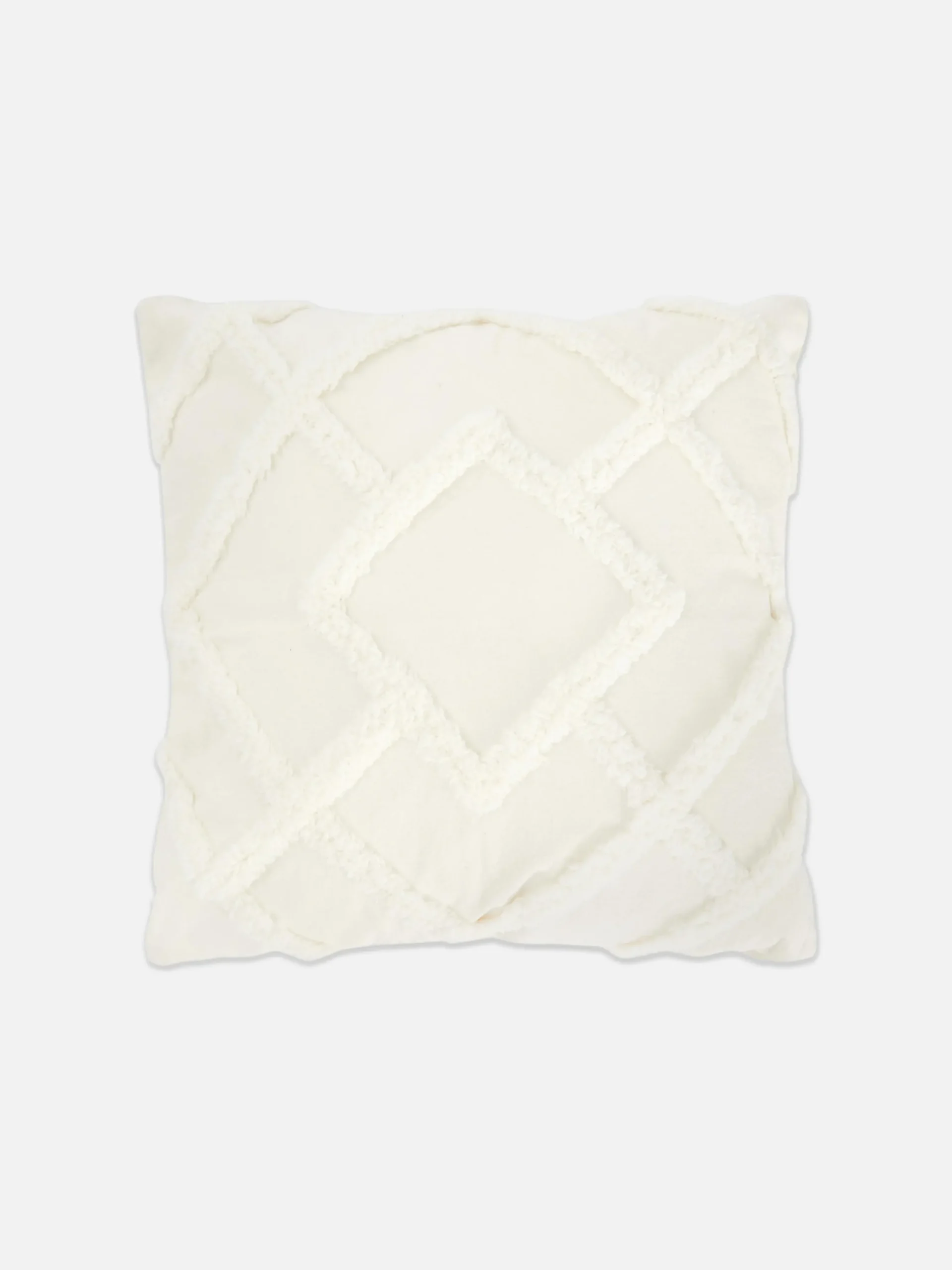 housse_de_coussin_touffet_0.webp Housse De Coussin Touffetée