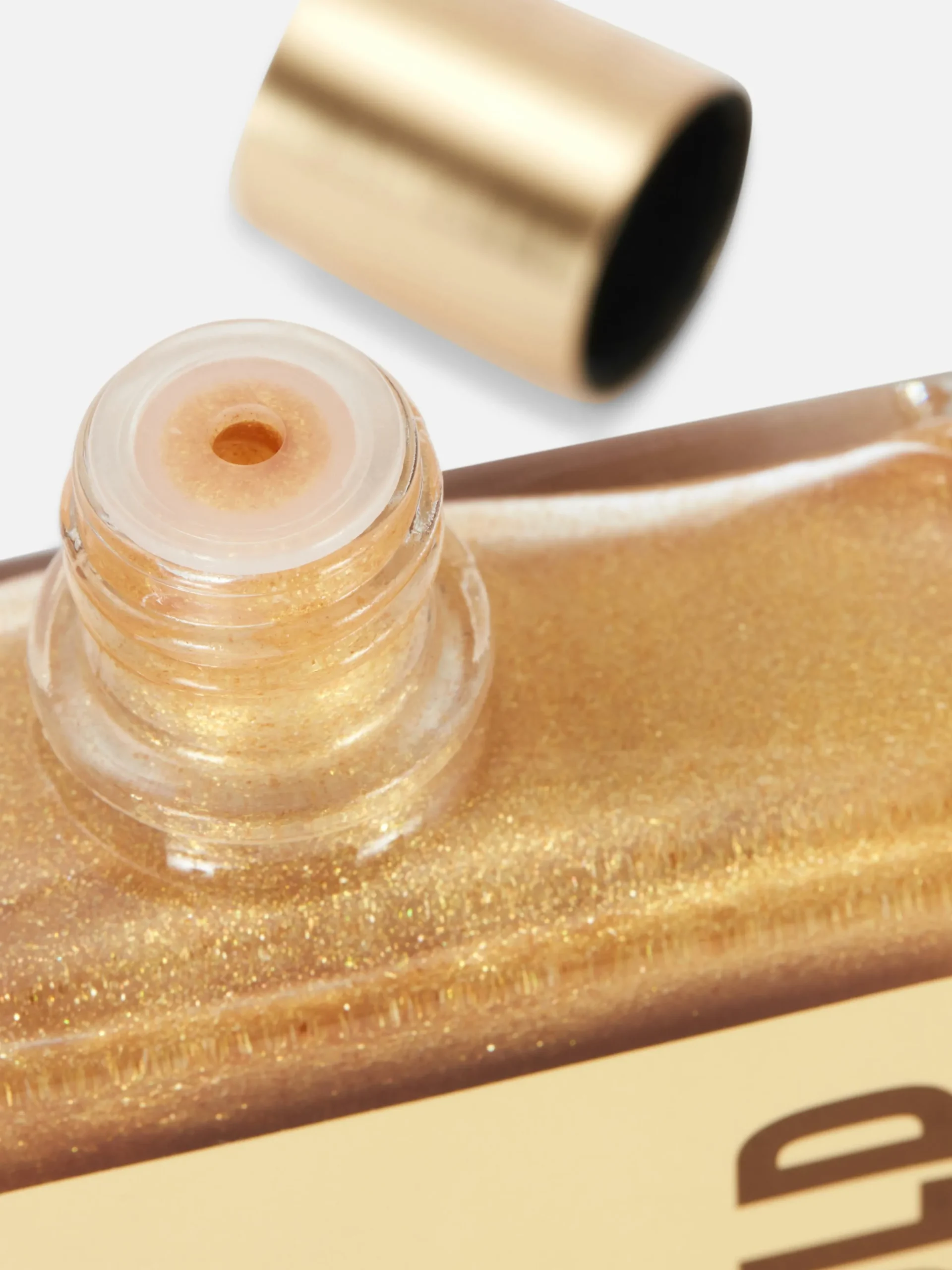 huile_scintillante_pour_l_1.webp Huile Scintillante Pour Le Corps PS... Pro