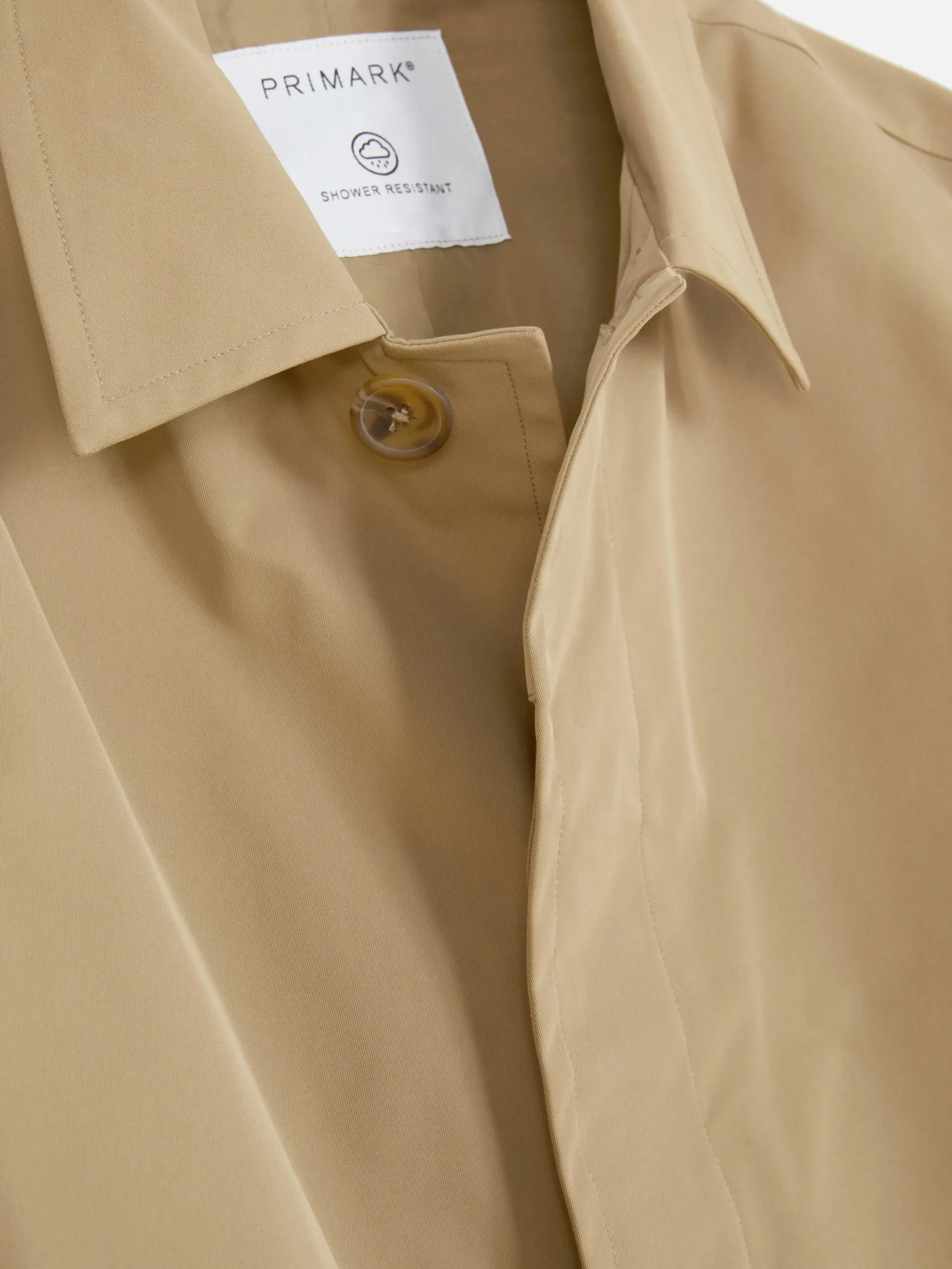 impermable_long__boutonna_5.webp Imperméable Long à Boutonnage Simple