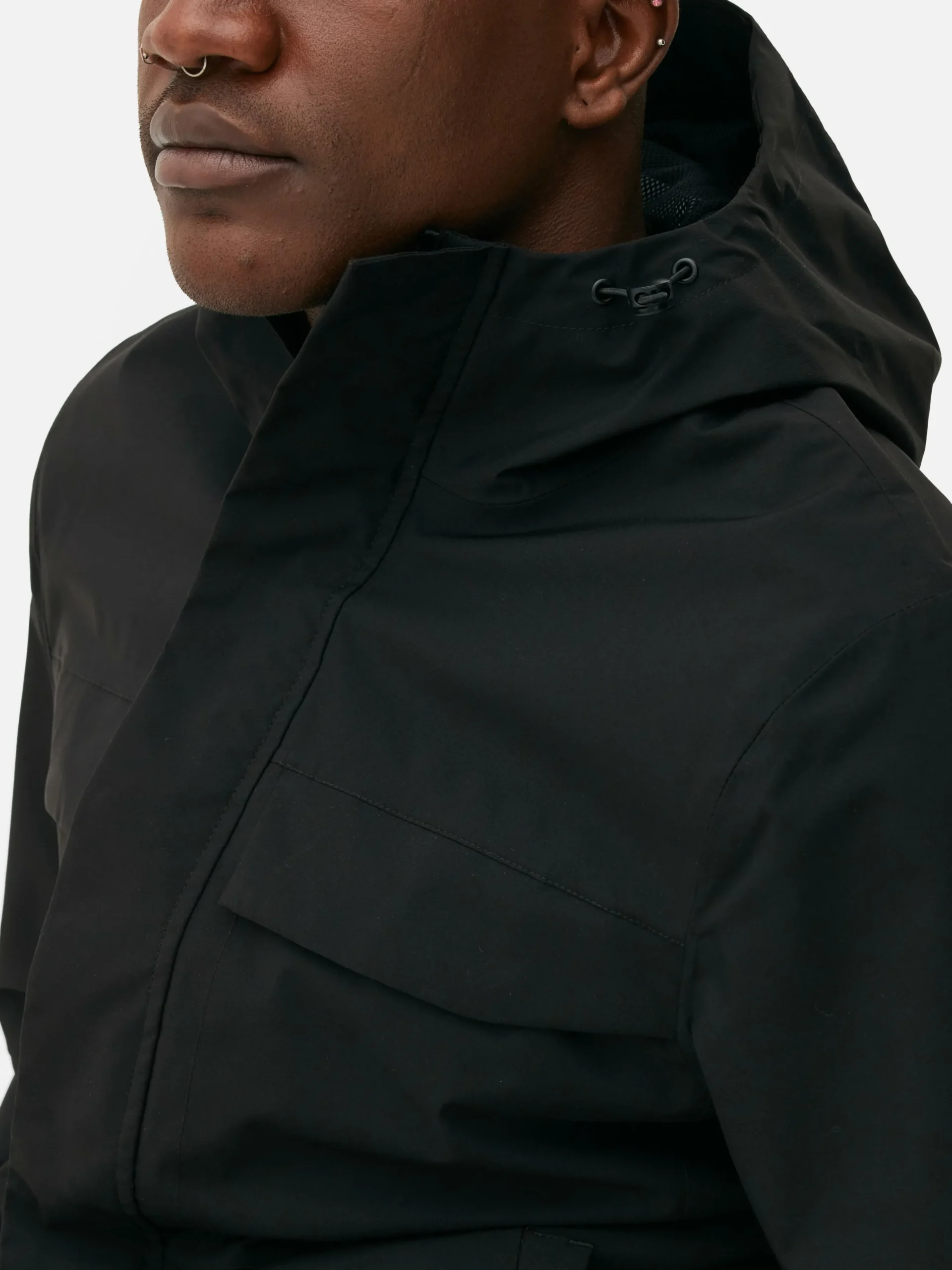 impermable_zipp__capuche_2.webp Imperméable Zippé à Capuche