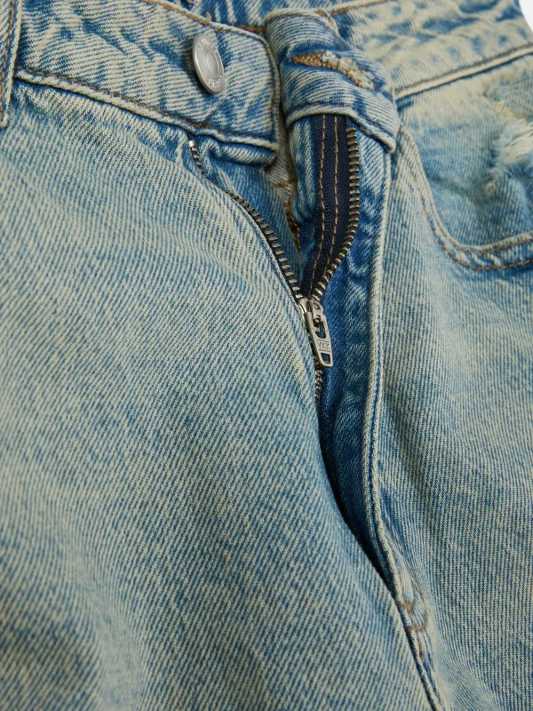 Jean Mom En Denim Déchiré