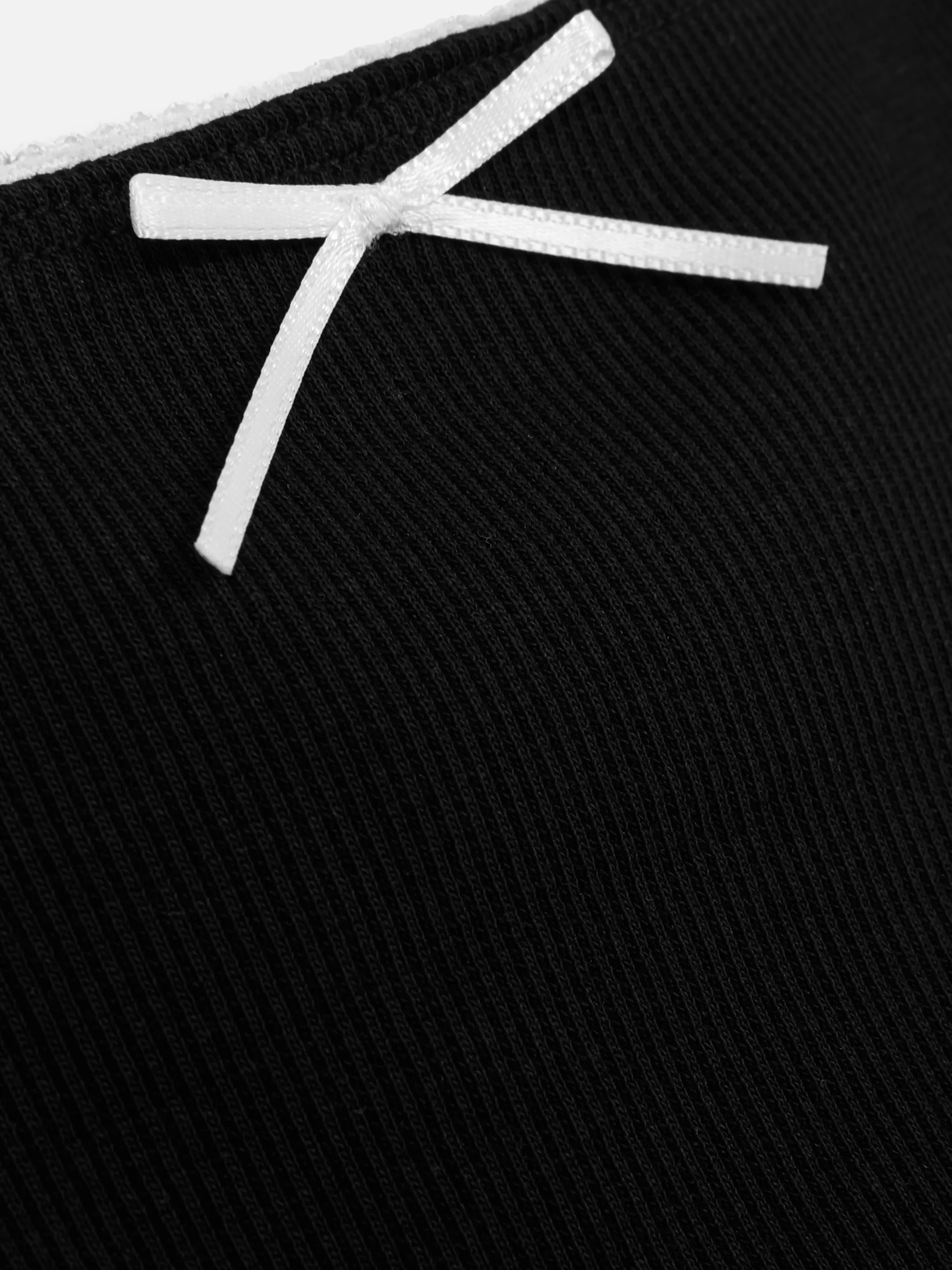 jupe_ctele__bord_ondul_2.webp Jupe Côtelée à Bord Ondulé