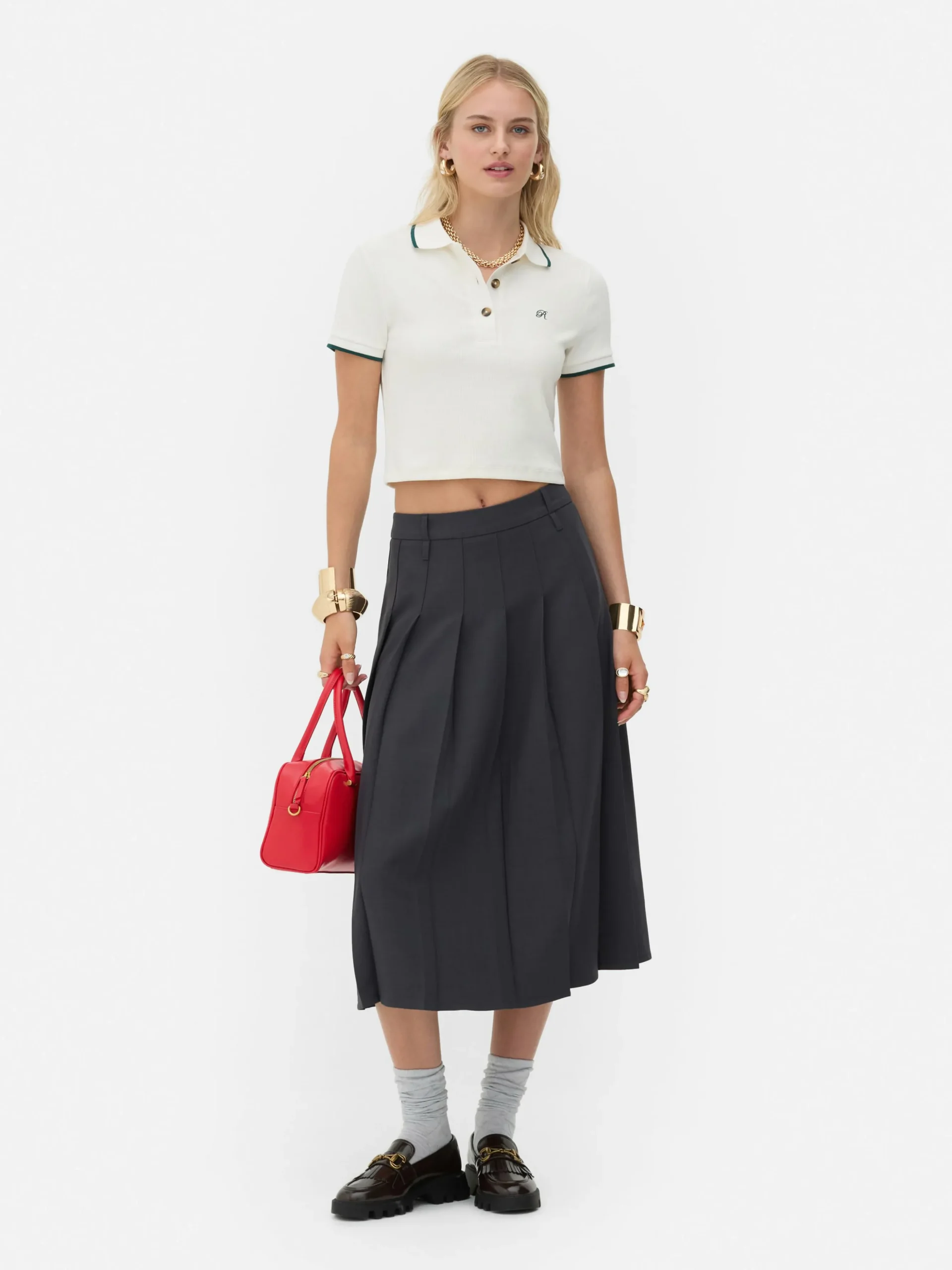 jupe_milongue_plisse_rita_0.webp Jupe Mi-longue Plissée Rita Ora