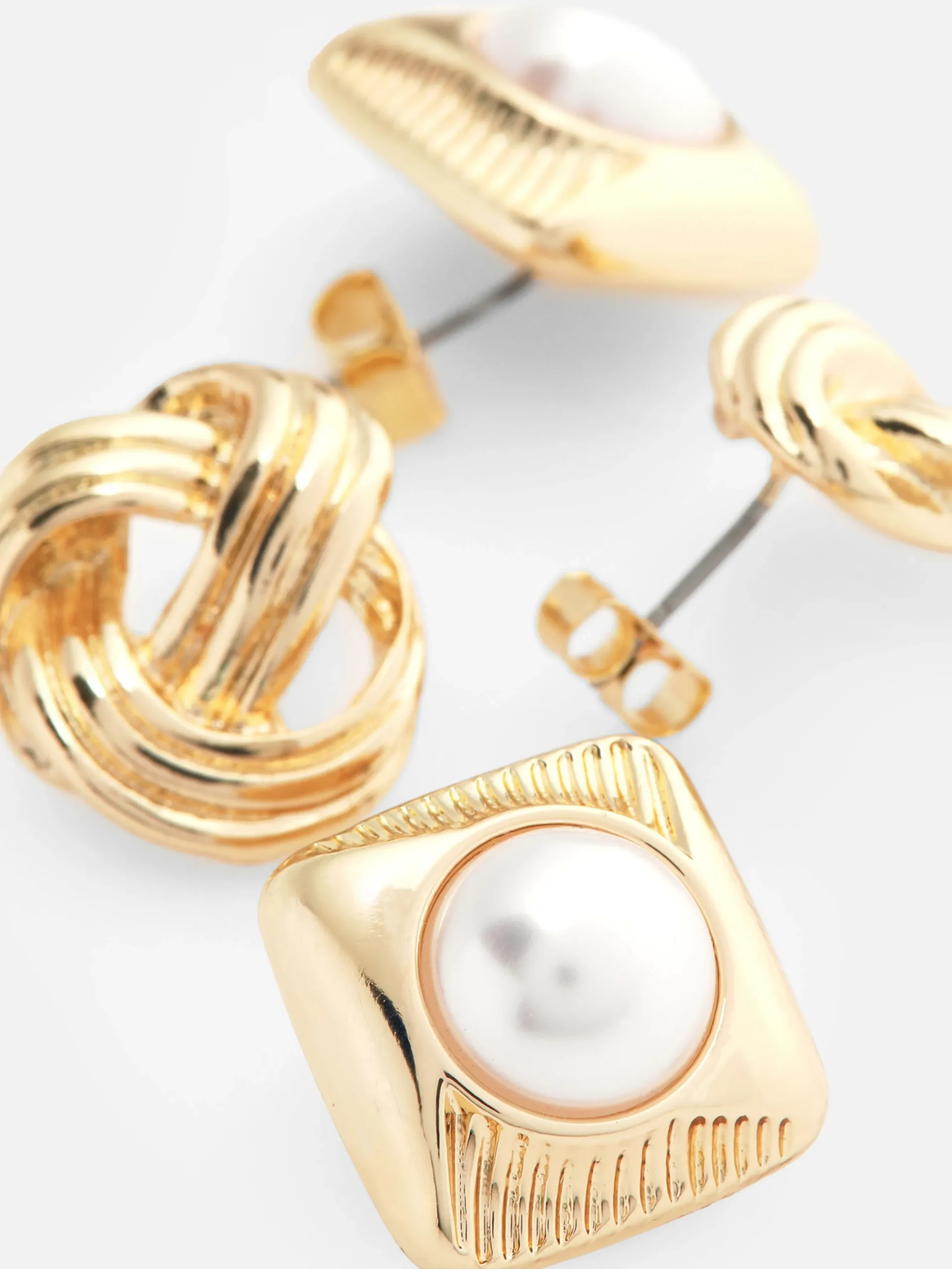 lot_de__clous_doreilles_n_1.webp Lot De 2 Clous D'oreilles Nœud Et Fausse Perle