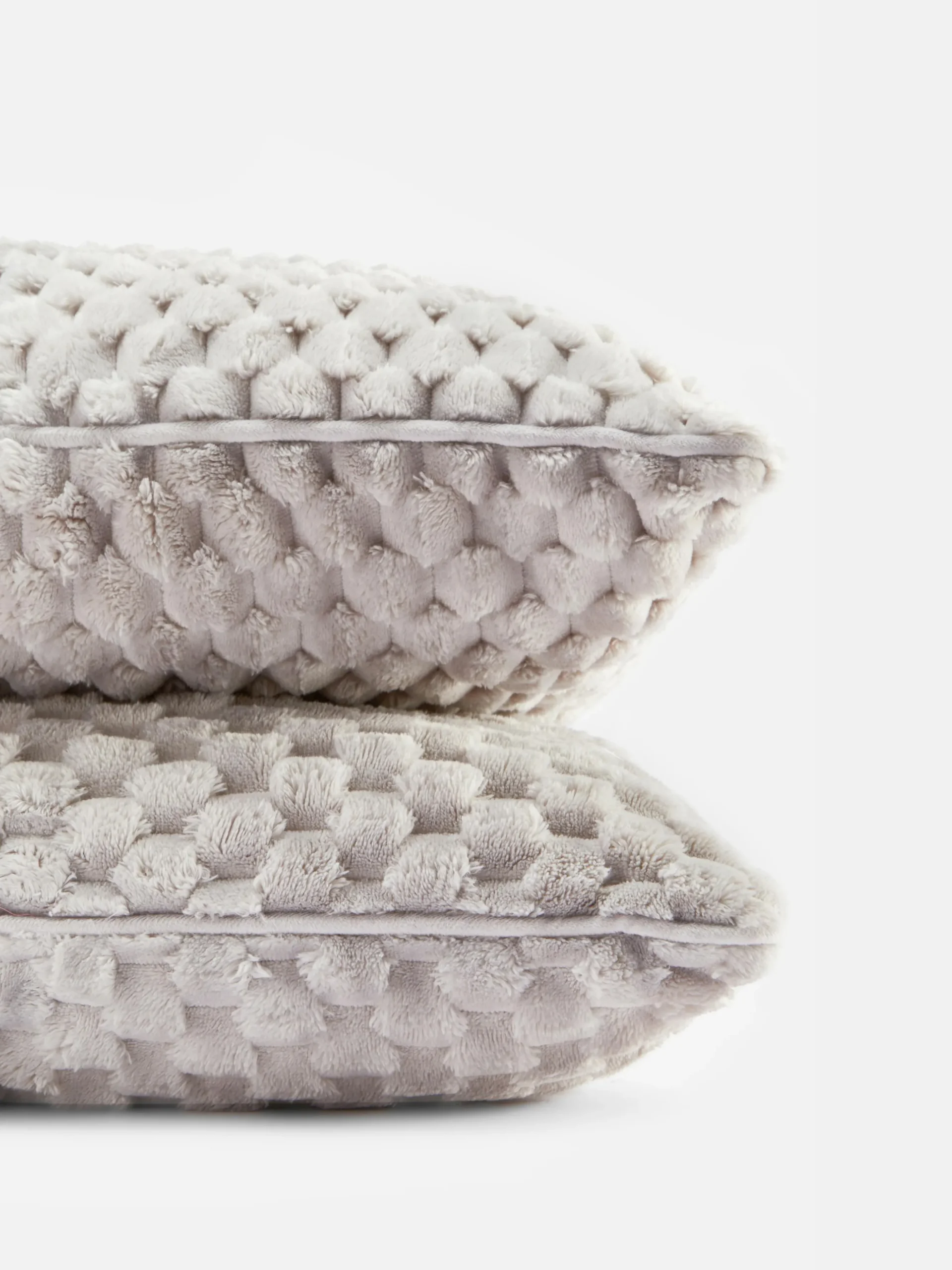 lot_de__coussins_texturs__1.webp Lot De 2 Coussins Texturés Effet Nid D’abeille