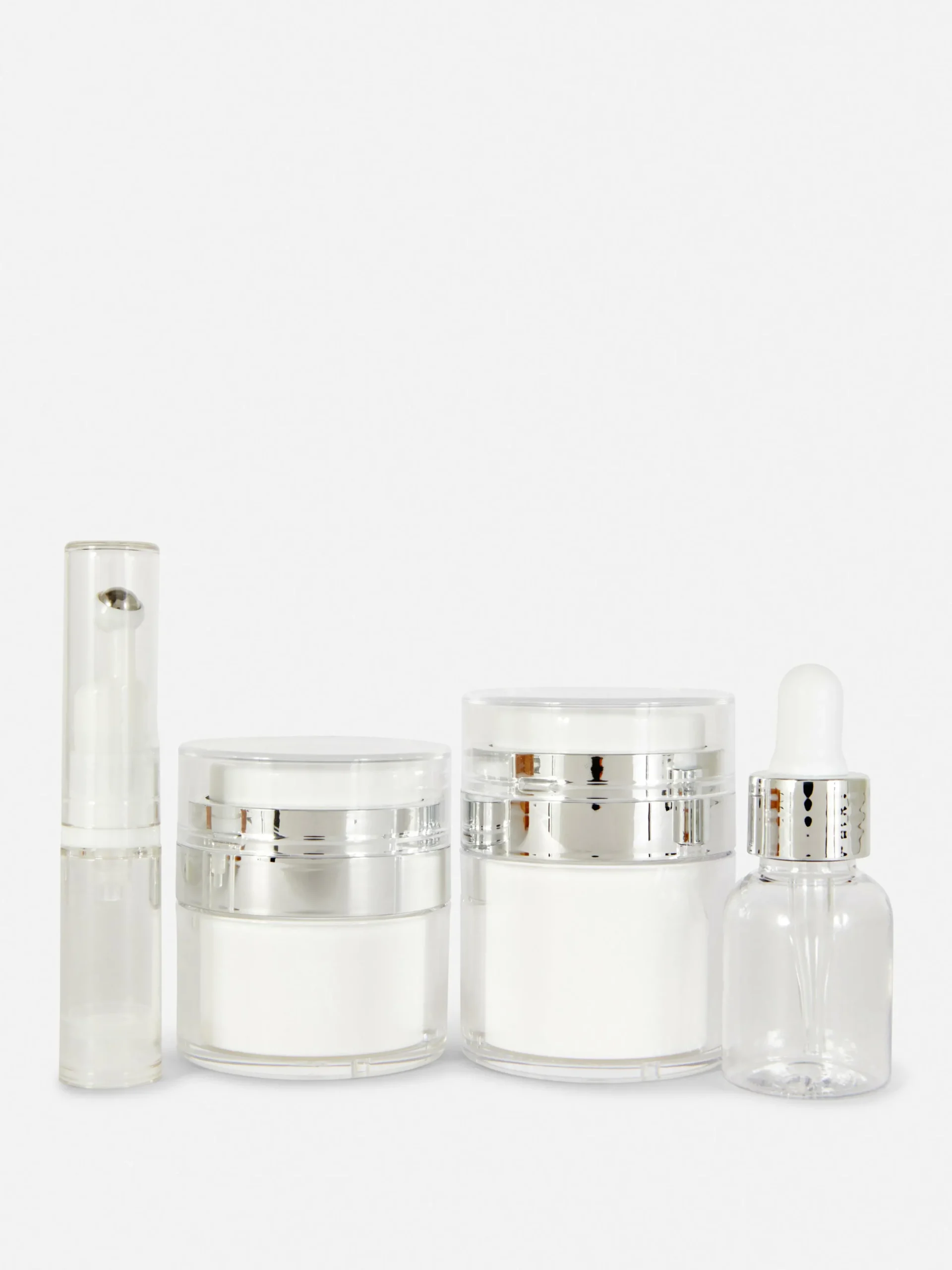 lot_de__soins_visage_de_v_0.webp Lot De 4 Soins Visage De Voyage