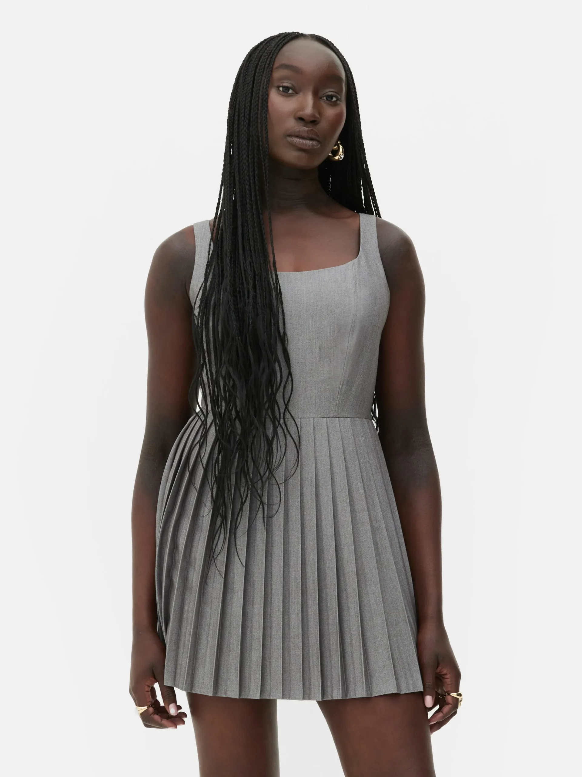 mini_robe_patineuse_pliss_1.webp Mini Robe Patineuse Plissée Rita Ora