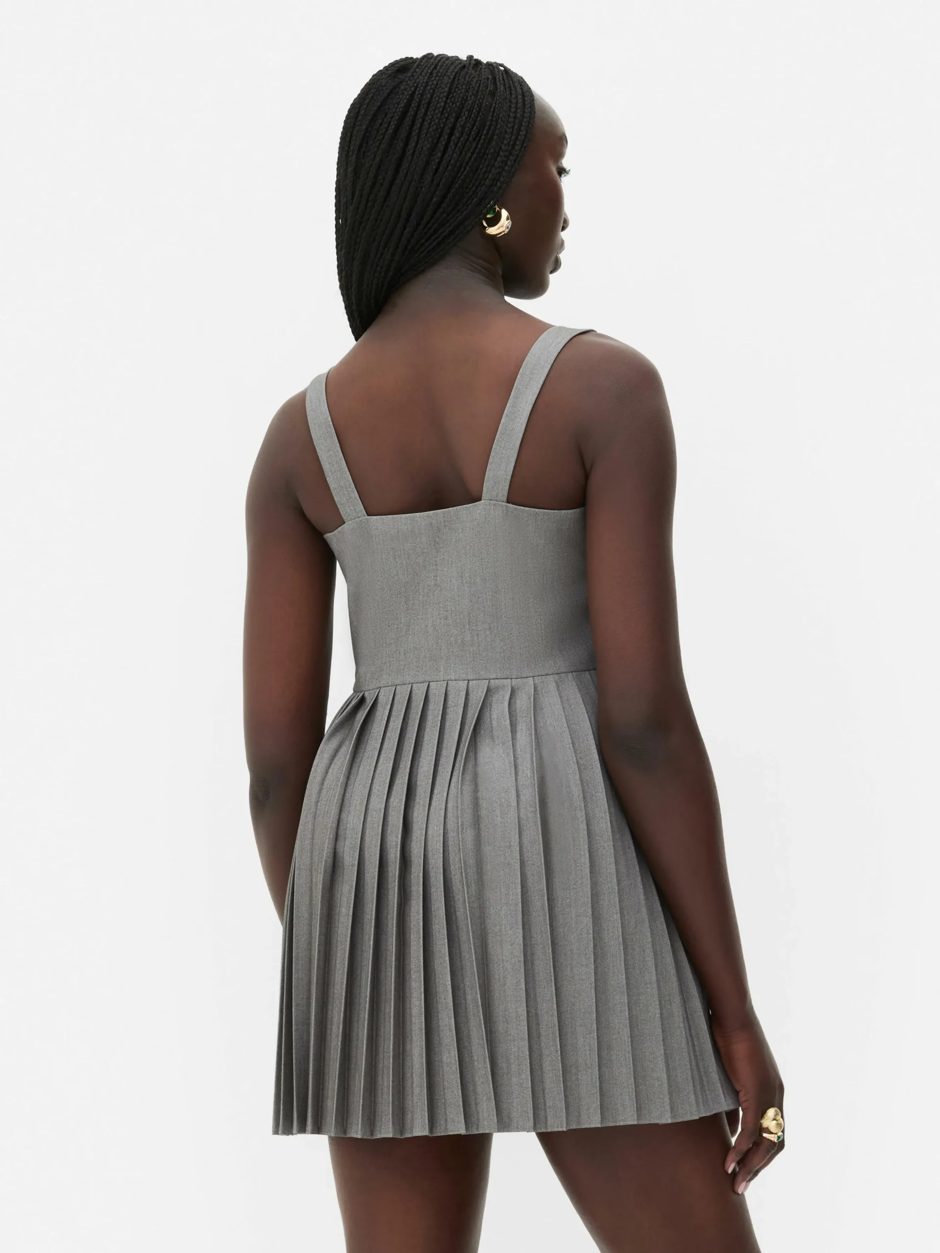 mini_robe_patineuse_pliss_3.webp Mini Robe Patineuse Plissée Rita Ora