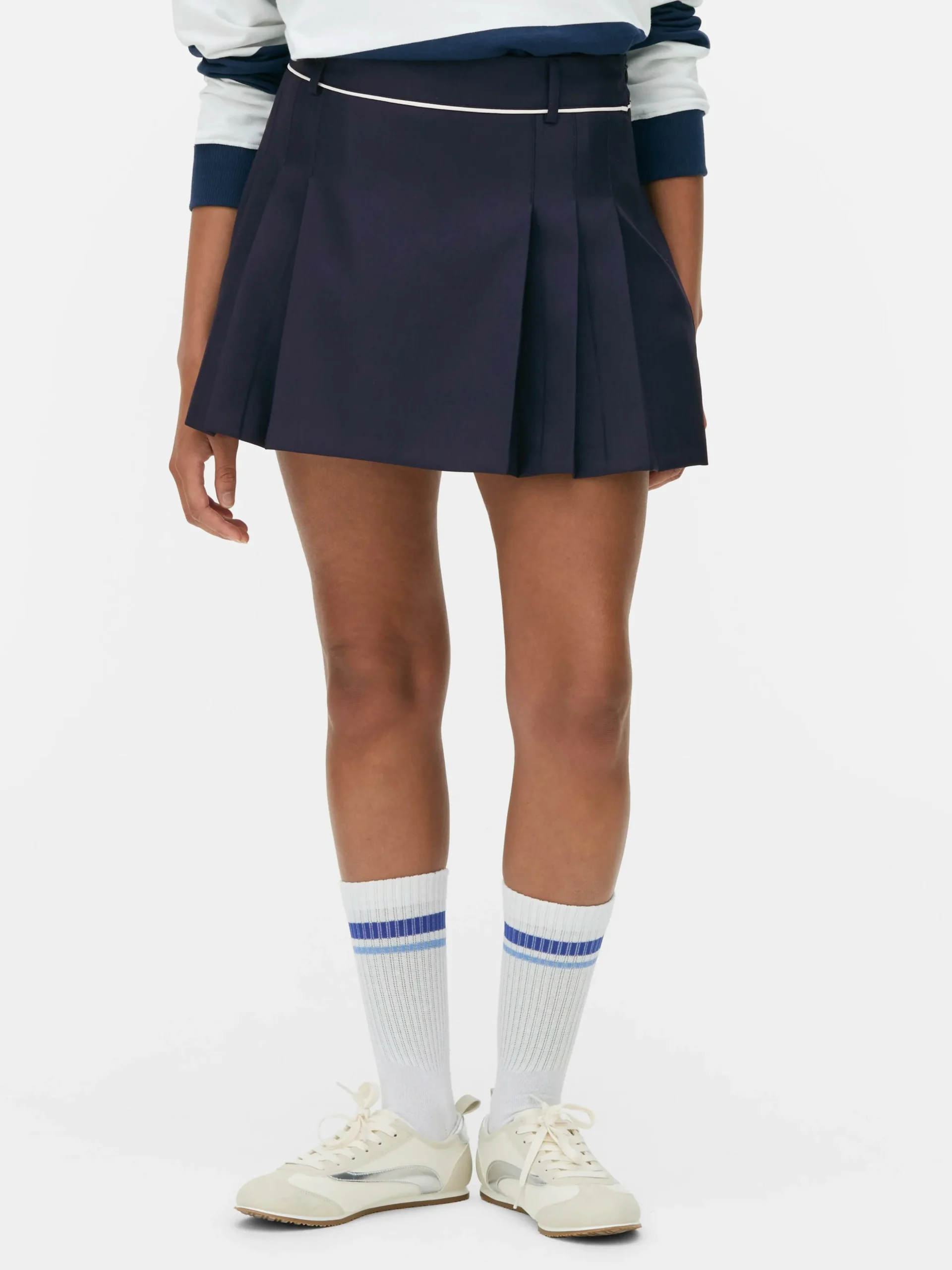 minijupe_de_tennis_plisse_1.webp Mini-jupe De Tennis Plissée