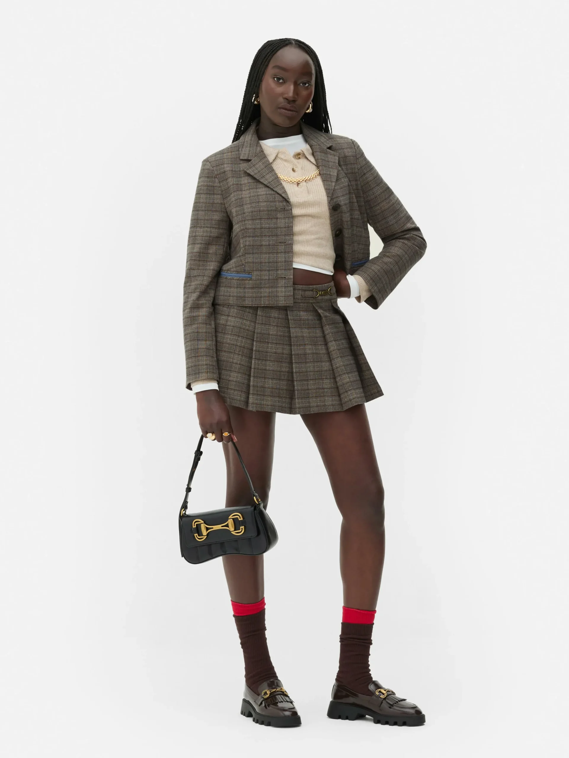 minijupeshort__carreaux_a_0.webp Mini-jupe-short à Carreaux Avec Mors Rita Ora