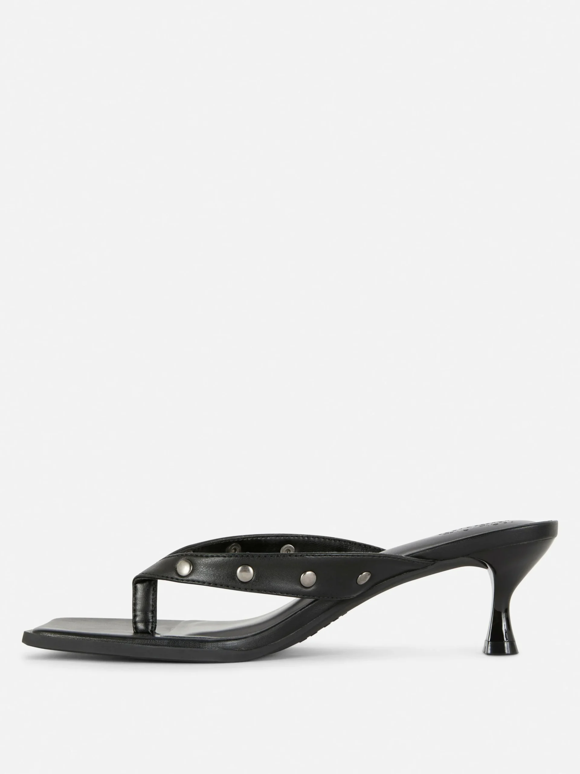 mules_cloutes_en_simili_c_3.webp Mules Cloutées En Simili Cuir Rita Ora