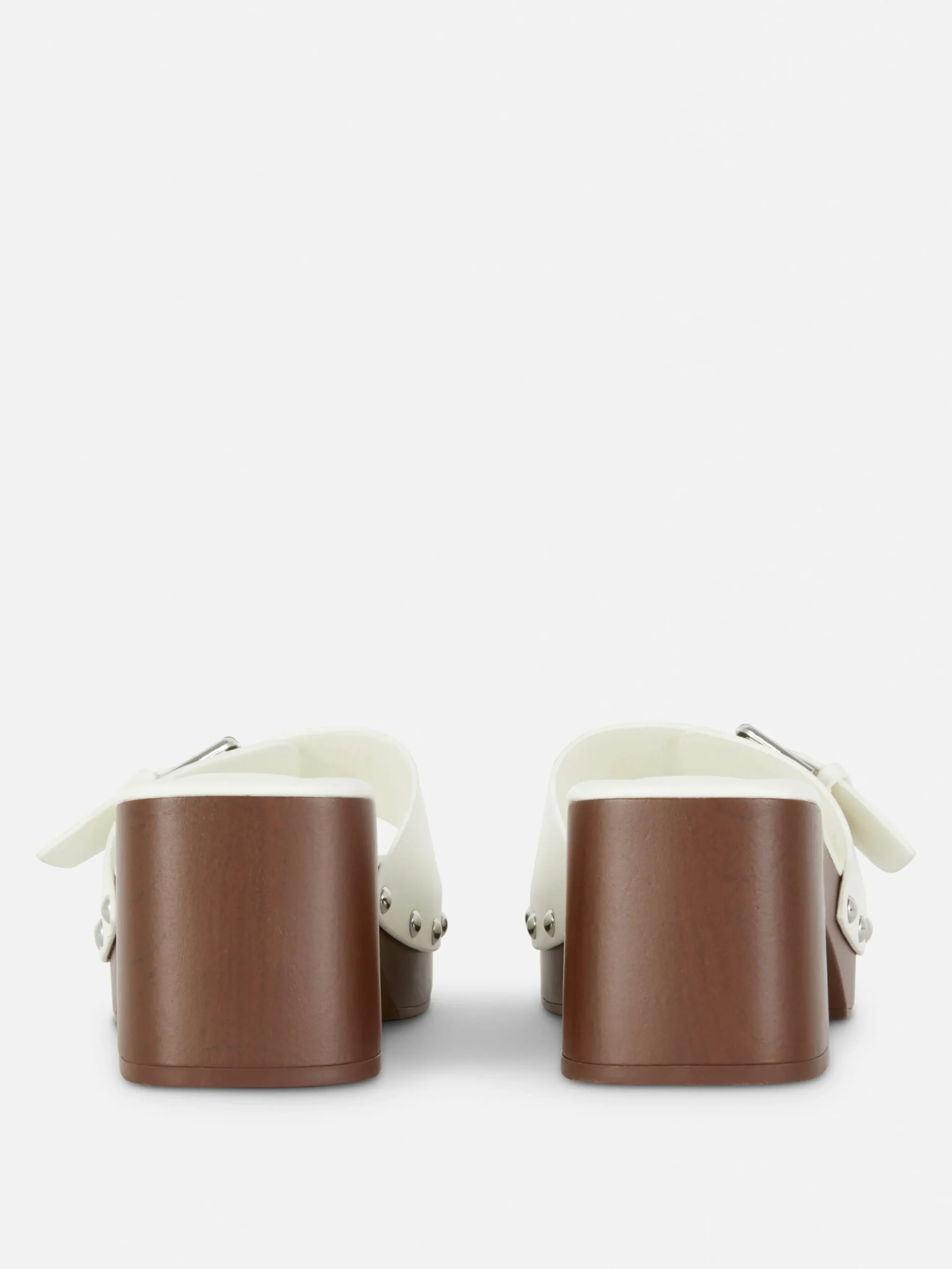 mules_sabots__talons_pais_2-1.webp Mules Sabots à Talons épais Rita Ora