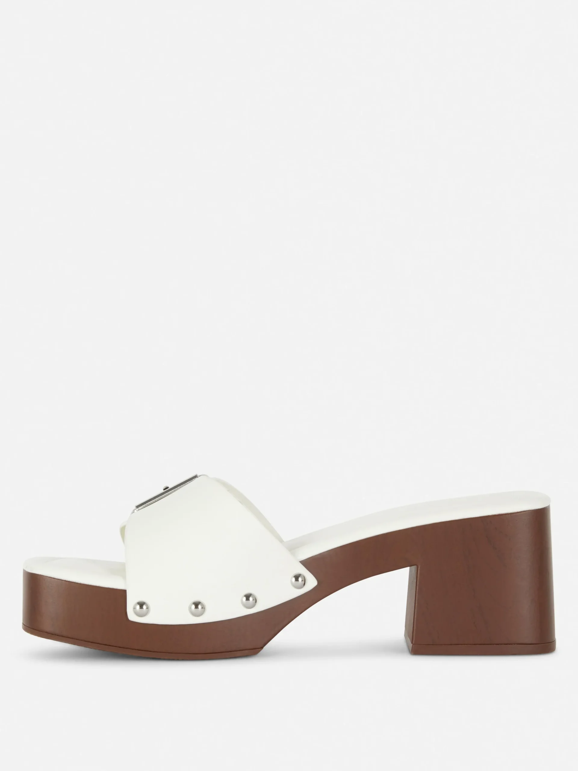 mules_sabots__talons_pais_3-1.webp Mules Sabots à Talons épais Rita Ora