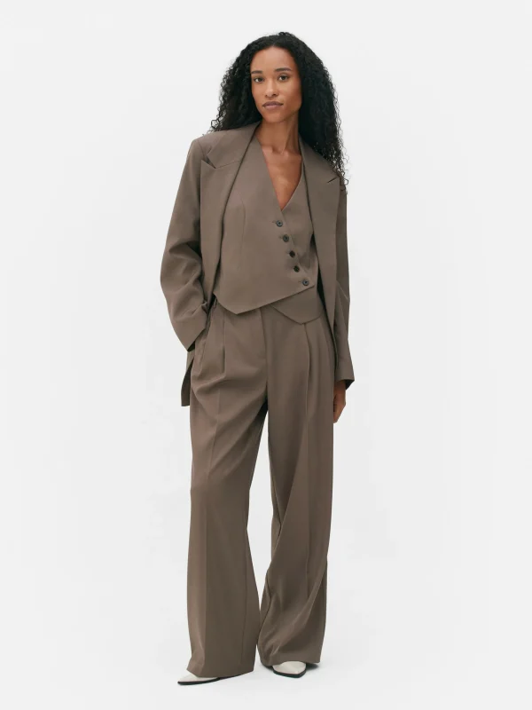 Pantalon Ajusté Plissé Sur Le Devant