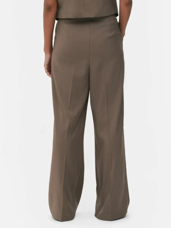 Pantalon Ajusté Plissé Sur Le Devant