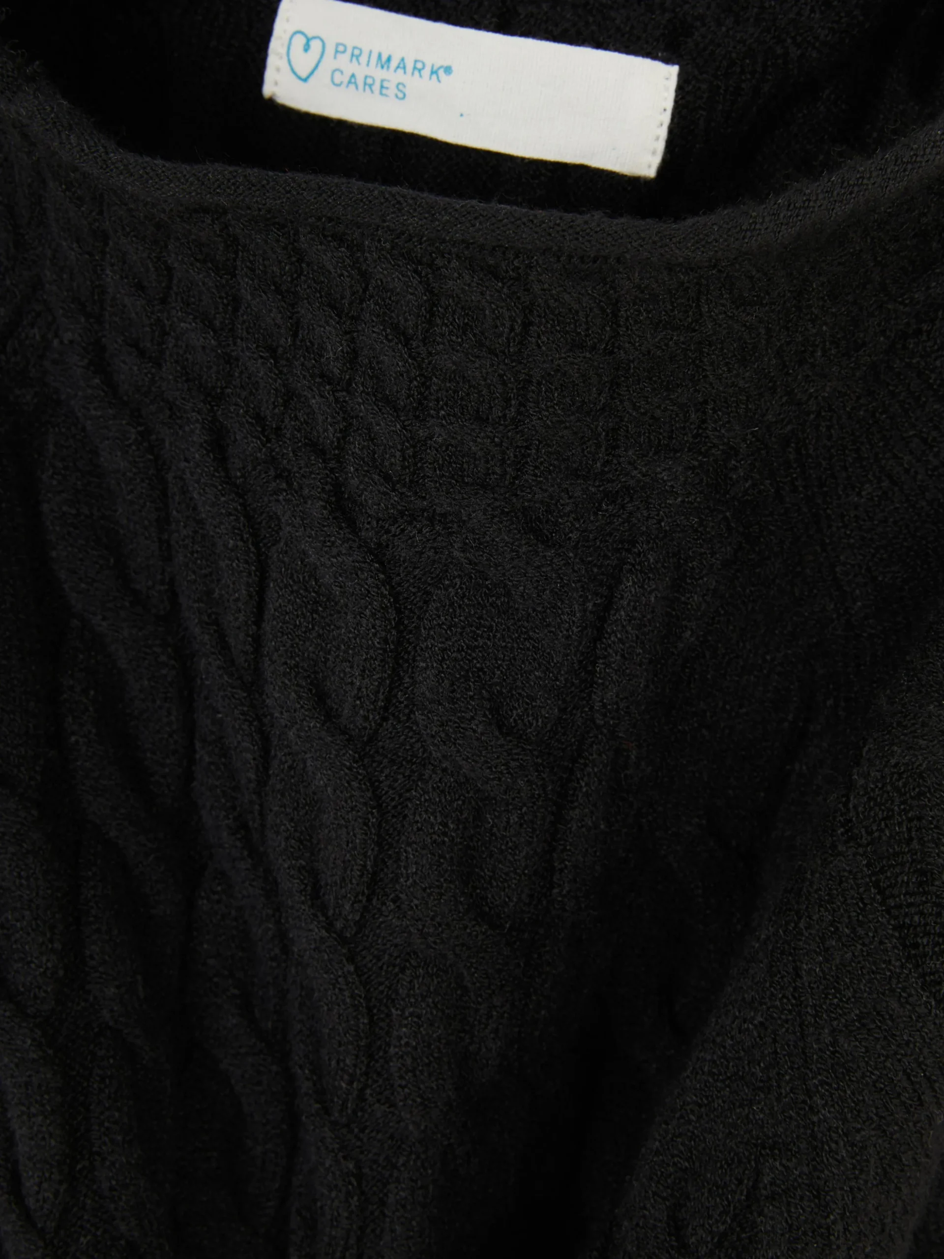 pull_en_maille_torsade__c_6.webp Pull En Maille Torsadée à Col Montant