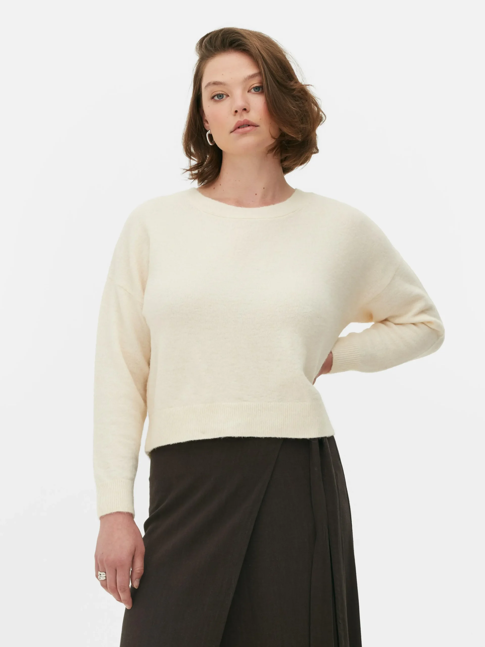 pull_tricot_avec_nud_dans_0-1.webp Pull Tricoté Avec Nœud Dans Le Dos