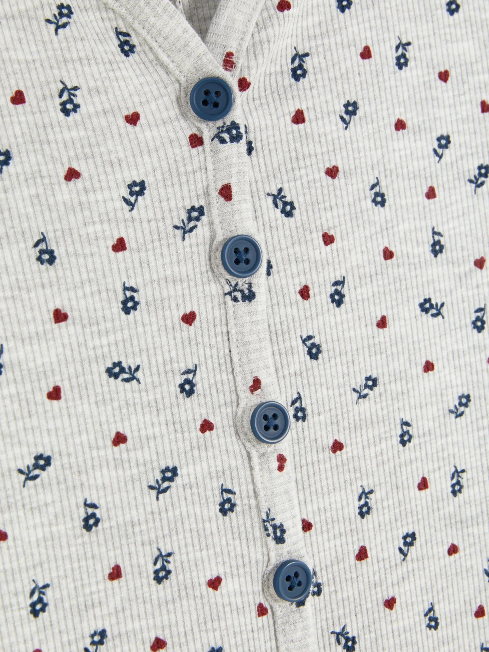 pyjama_style_barboteuse_c_1.webp Pyjama Style Barboteuse Côtelé à Petites Fleurs