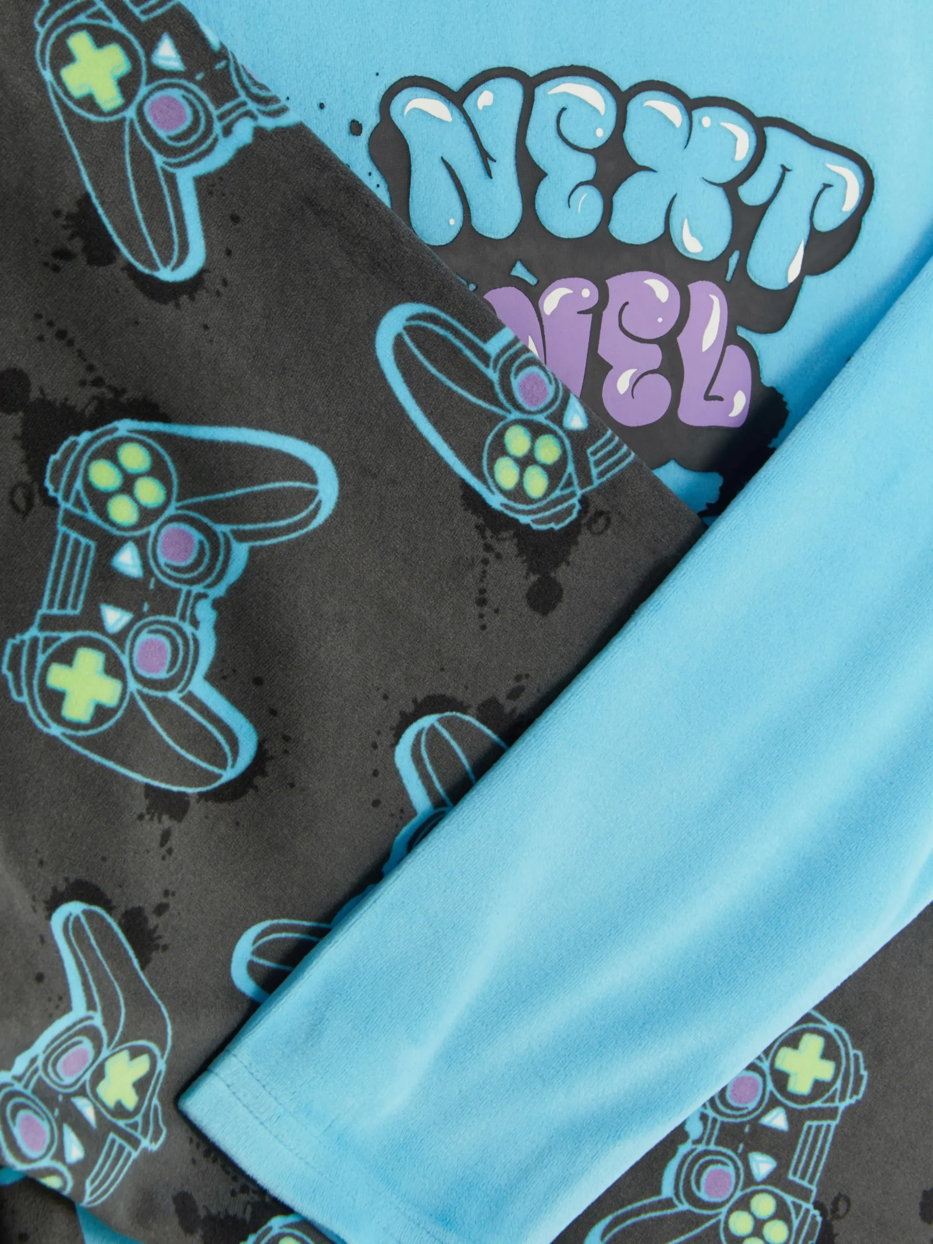 pyjama_tshirt_et_bas__mot_2.webp Pyjama T-shirt Et Bas à Motif Manette De Jeu Vidéo