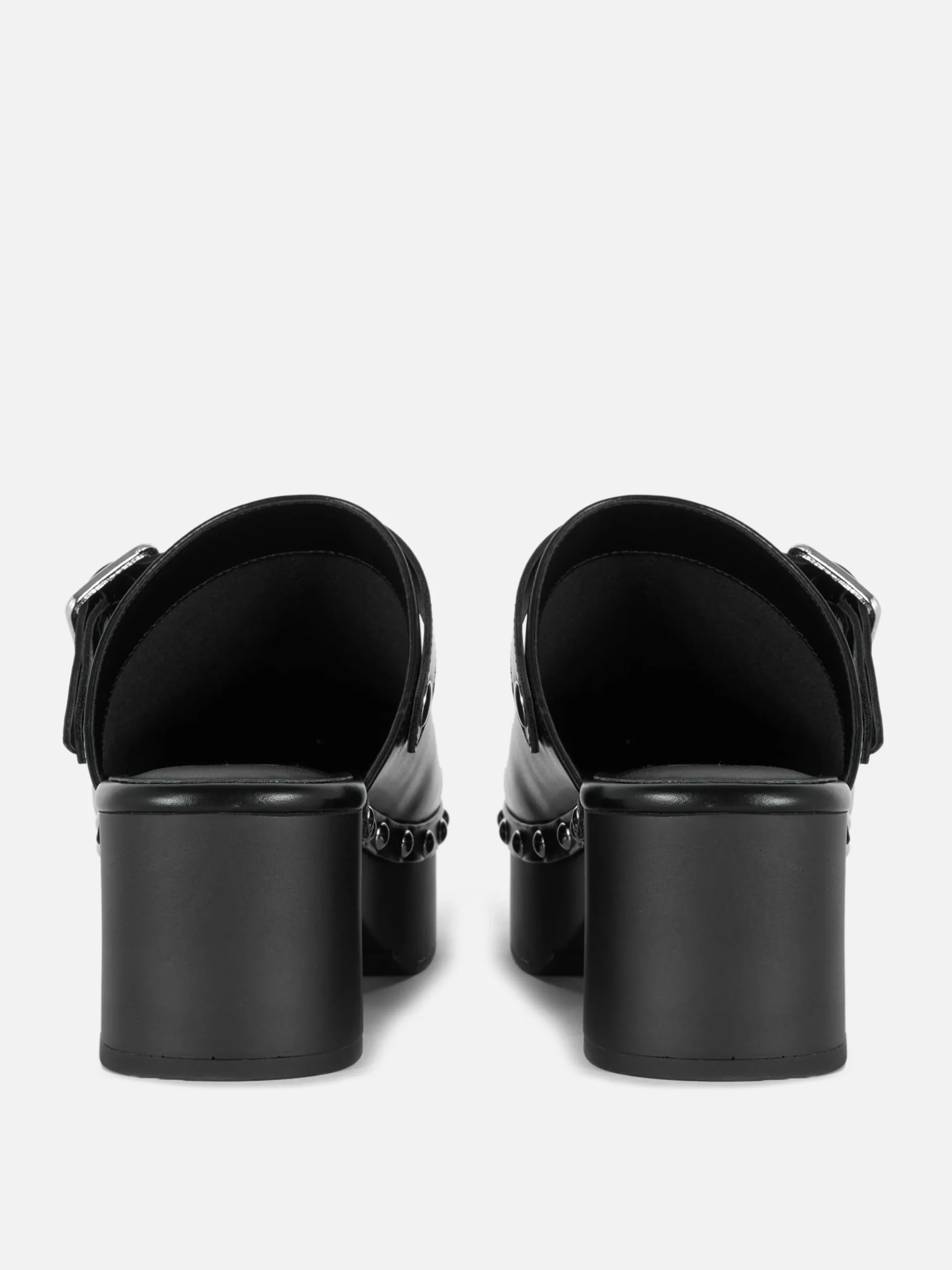 sabots_clouts__talon_pais_2.webp Sabots Cloutés à Talon épais Rita Ora