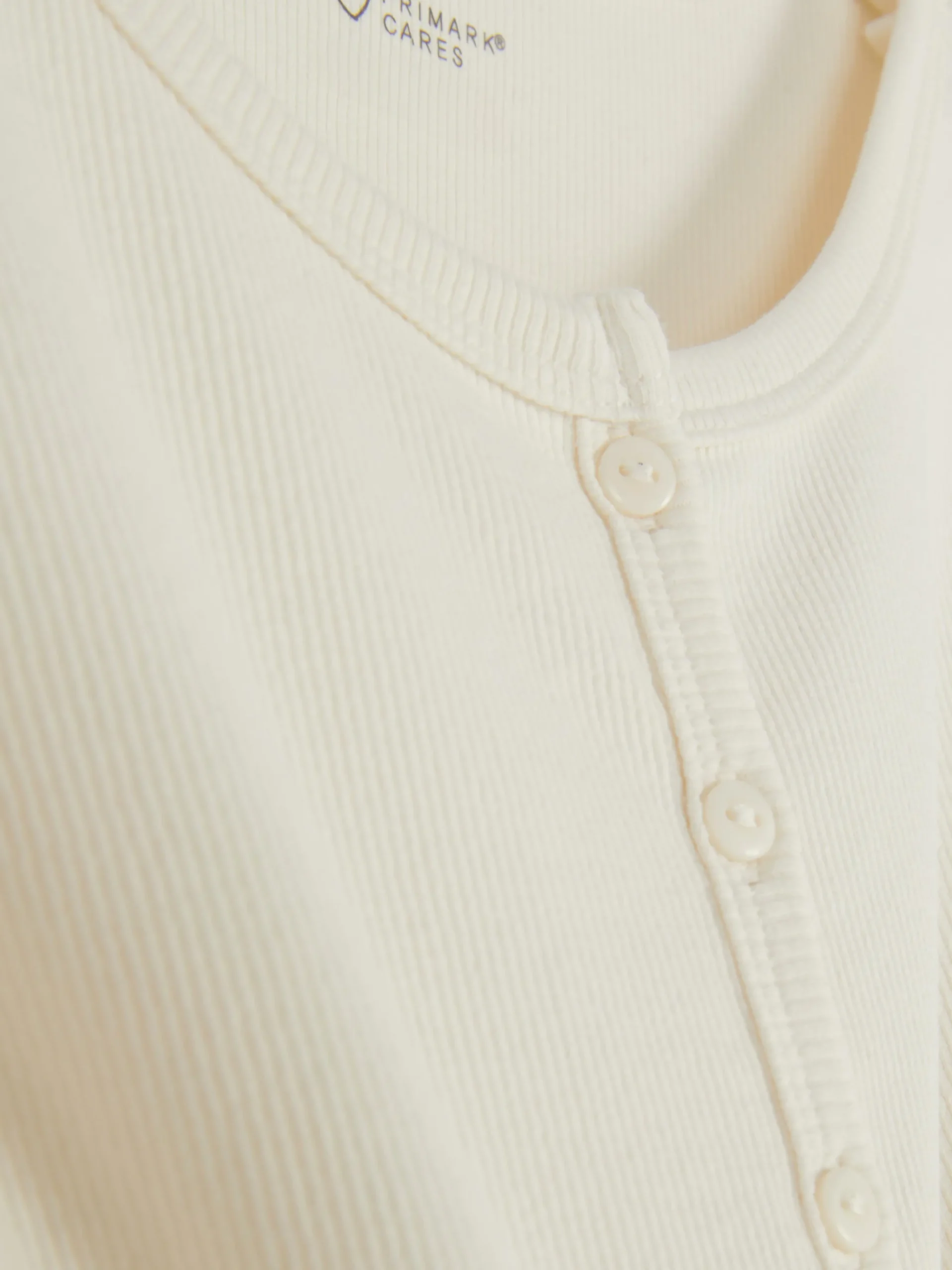 tshirt_ctel_boutonn_2.webp T-shirt Côtelé Boutonné